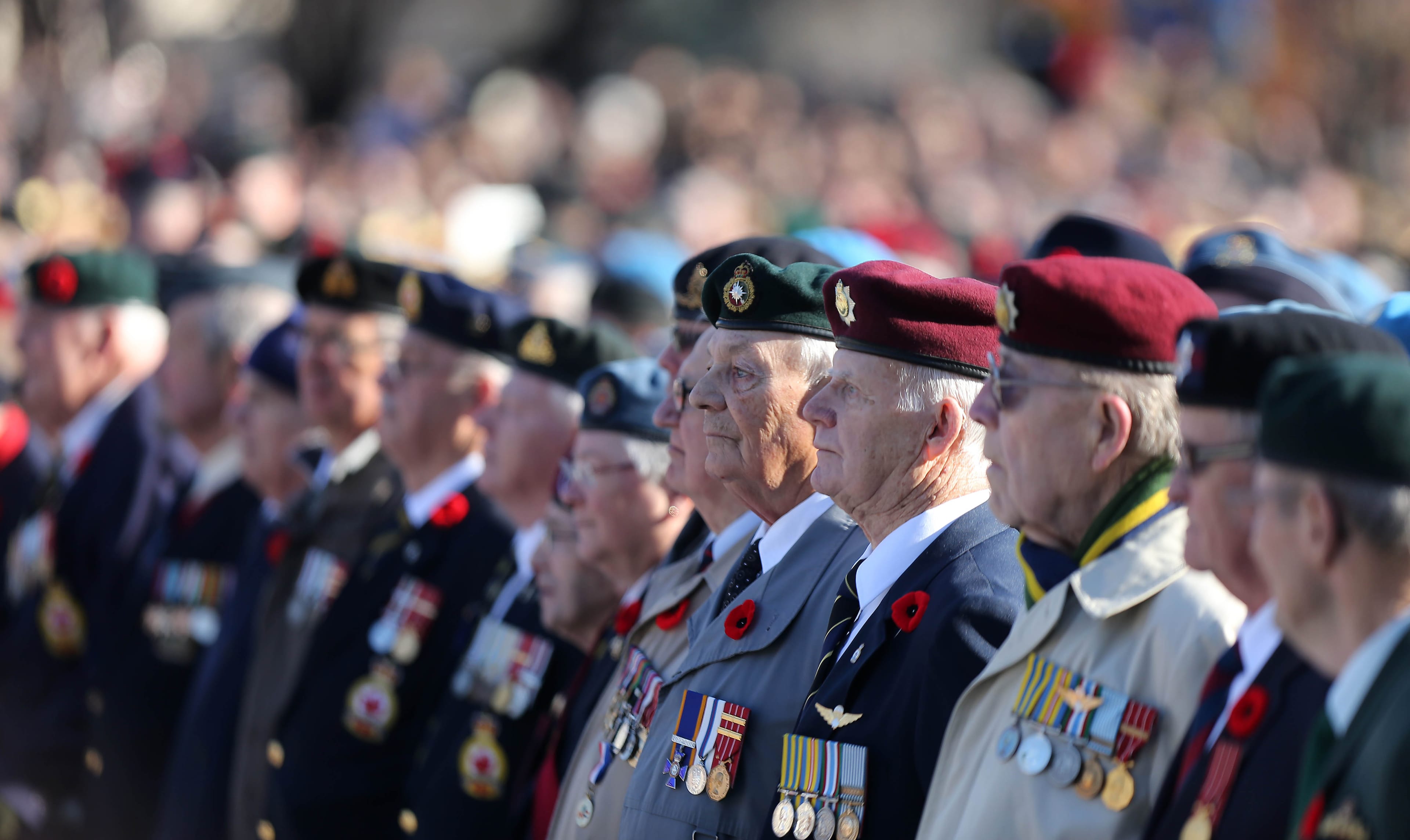 Veterans watch the Remembrance Day ceremony at Ottawa's National War Memorial on Nov. 11, 2014. (Steve Russell/Toronto Star via Getty Images)