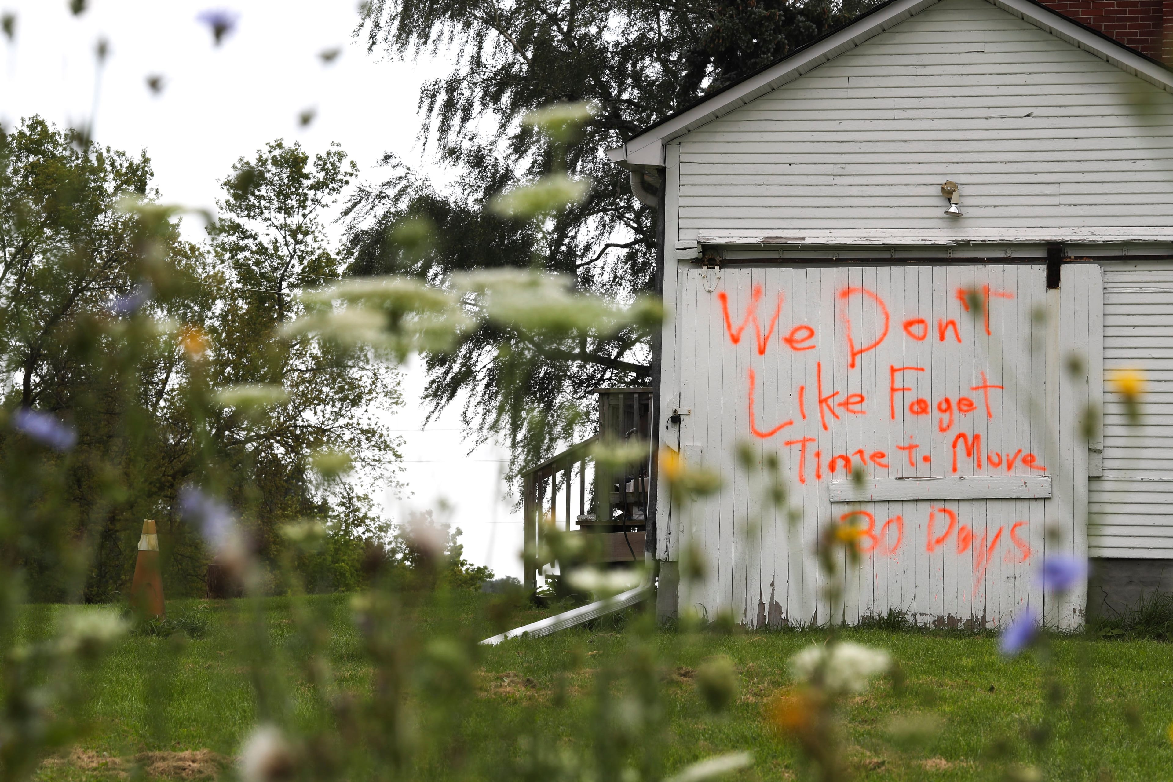 Hateful anti-gay graffiti on a garage in north Pickering, Ont. Southern Ontario cities saw a marked rise in reported hate crimes in 2017  (Richard Lautens/Toronto Star/Getty Images)