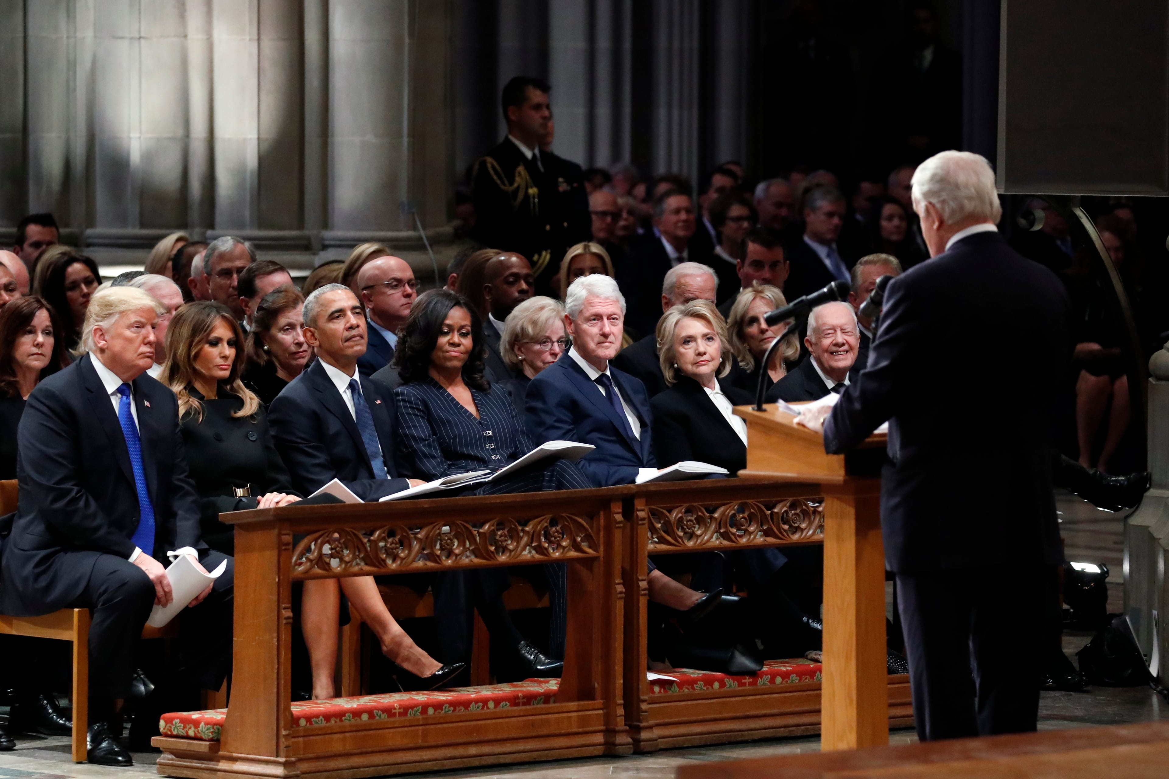 From left, President Donald Trump, first lady Melania Trump, former President Barack Obama, Michelle Obama, former President Bill Clinton, former Secretary of State Hillary Clinton, and former President Jimmy Carter listen as former Canadian Prime Minister Brian Mulroney speaks during a state funeral for former U.S. President George H. W. Bush at the Washington National Cathedral on December 5, 2018 in Washington, DC. President Bush will be buried at his final resting place at the George H.W. Bush Presidential Library at Texas A&amp;M University in College Station, Texas. A WWII combat veteran, Bush served as a member of Congress from Texas, ambassador to the United Nations, director of the CIA, vice president and 41st president of the United States. (Alex Brandon/Getty Images)