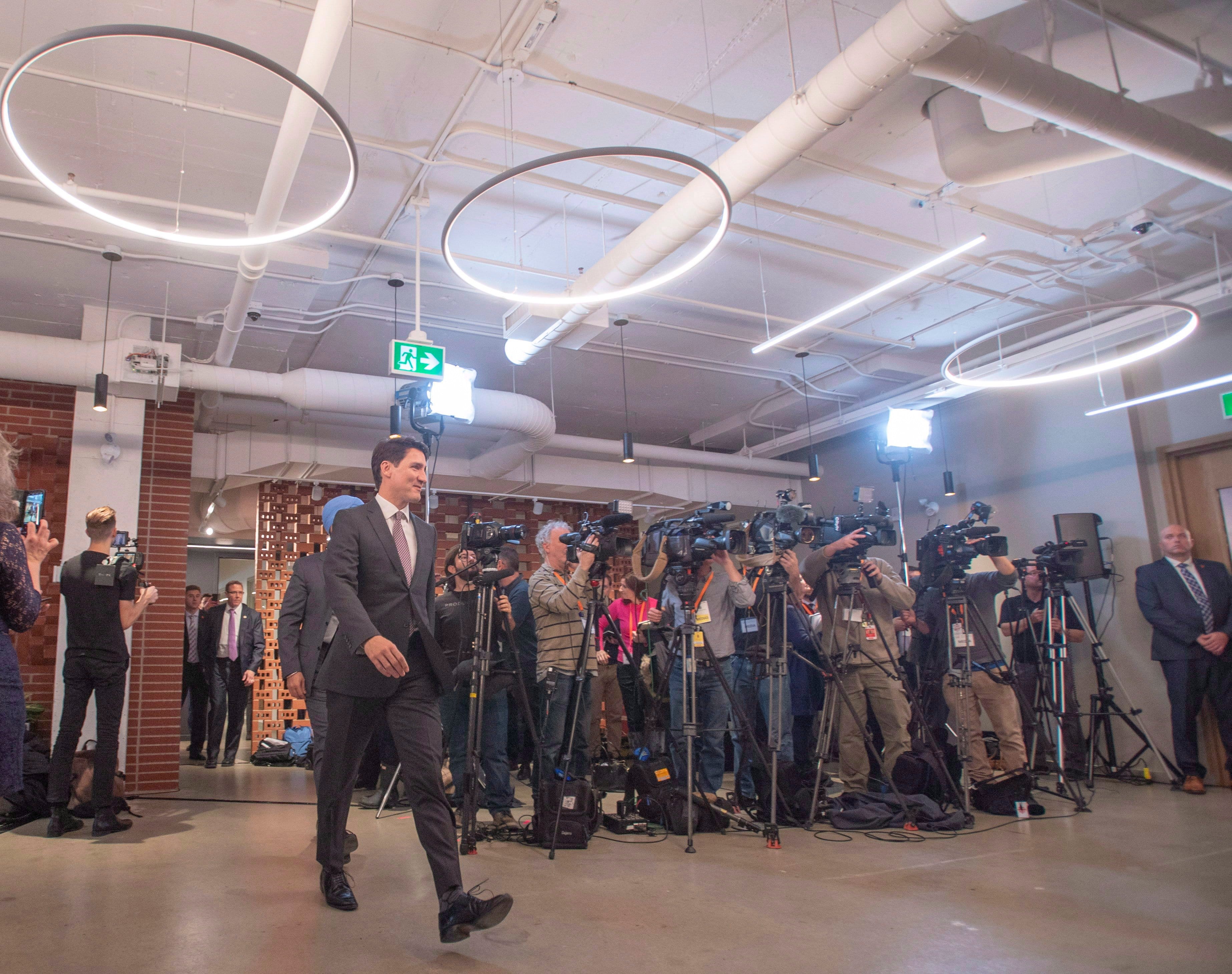 Prime Minister Justin Trudeau arrives for a press conference at Element AI Thursday, Dec. 6, 2018 in Montreal. (THE CANADIAN PRESS/Ryan Remiorz)