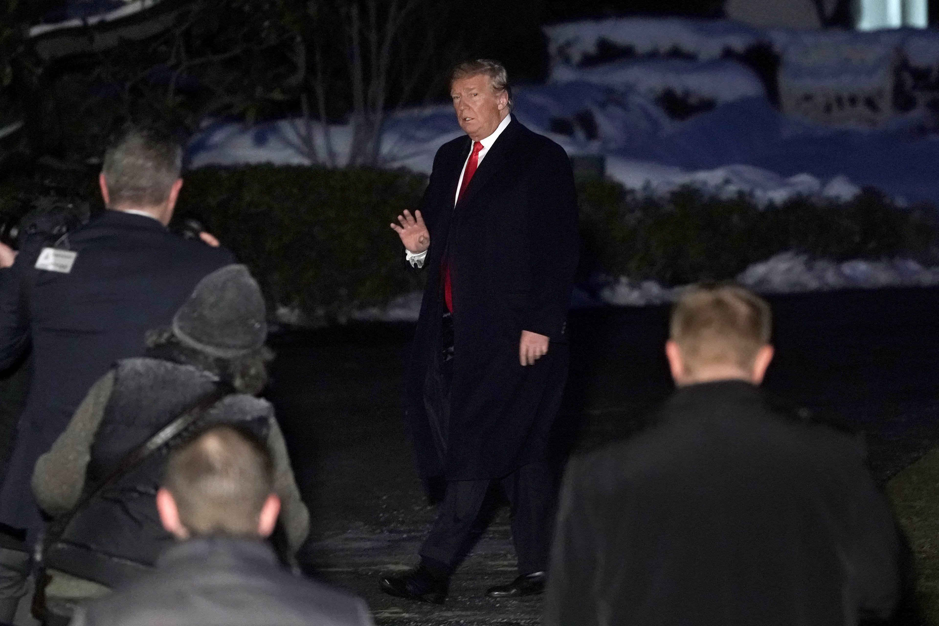 Trump walks on the South Lawn after his return to the White House on Jan. 14, 2019 in Washington, DC. (Alex Wong/Getty Images)