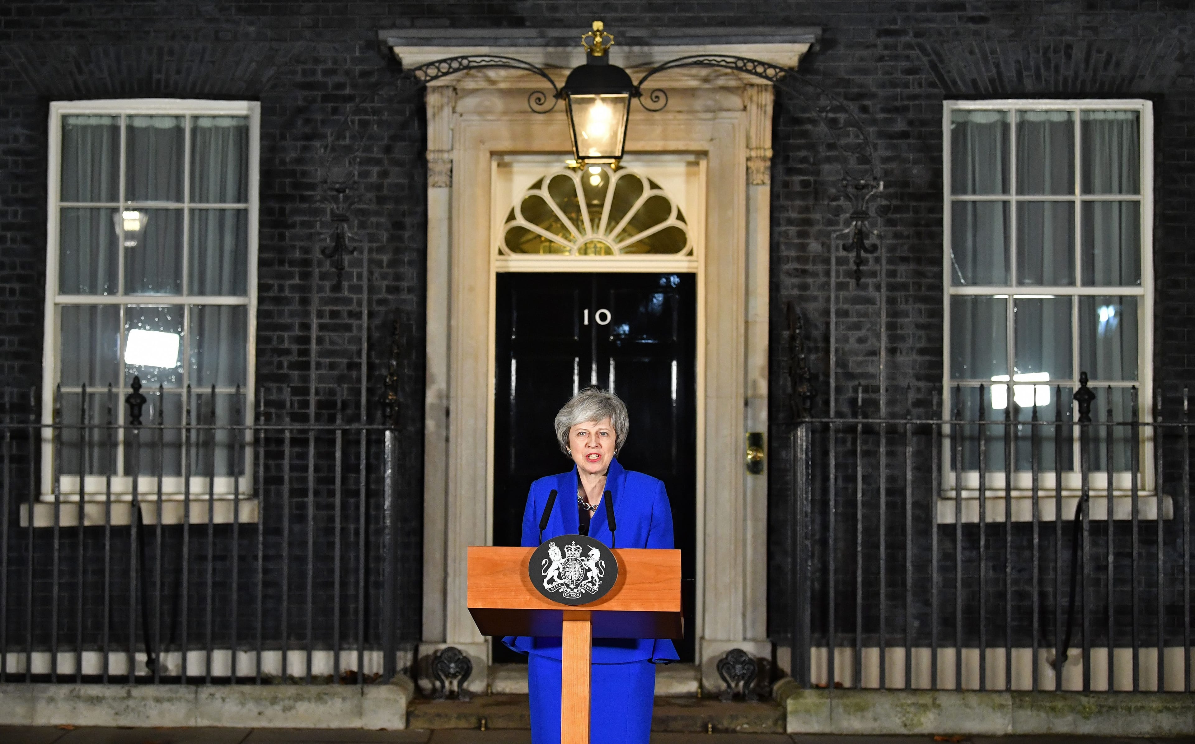 Britain's Prime Minister Theresa May delivers a statement to members of the media in Downing Street in London on January 16, 2019, after surviving a vote of no confidence in her government. (Photo by Ben STANSALL / AFP)        