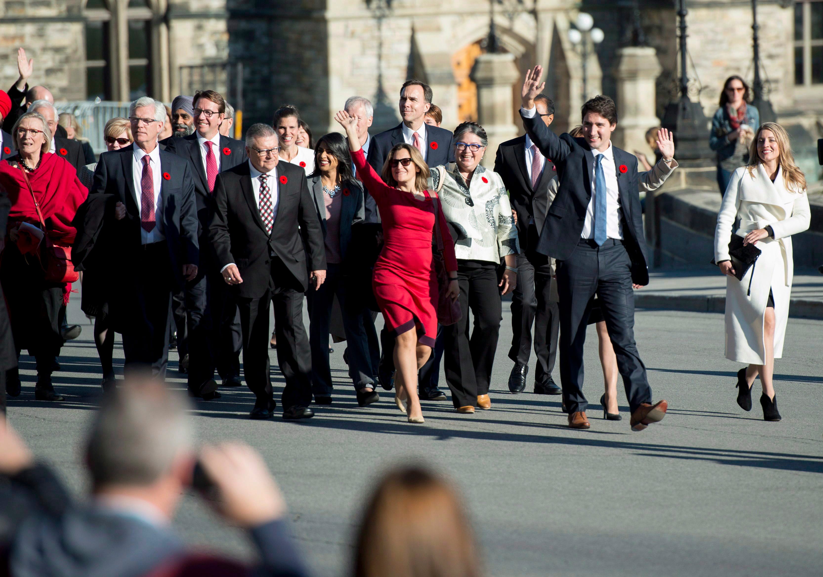 Trudeau arrives on Parliament Hill with his newly sworn-in cabinet ministers, in Ottawa on Wednesday, Nov. 4, 2015. (THE CANADIAN PRESS/Justin Tang)