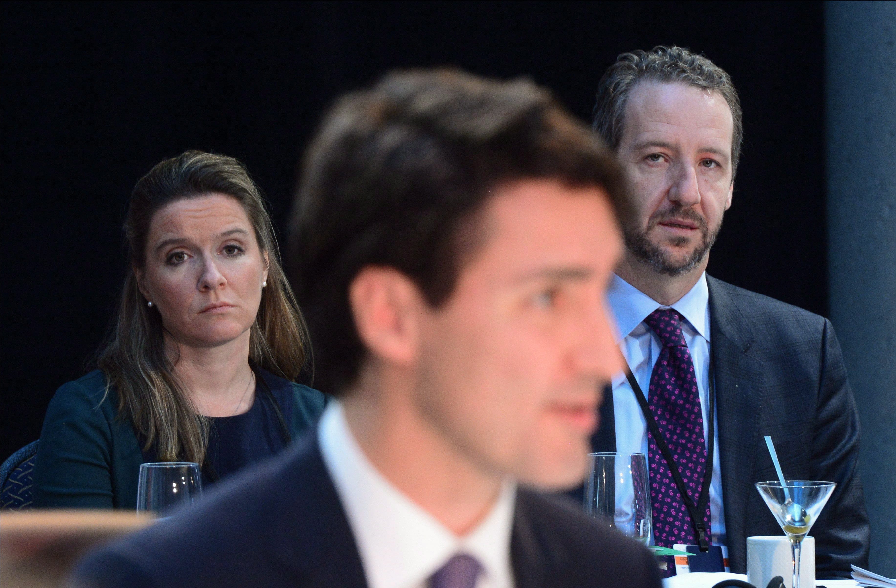 Telford and Butts look on as Trudeau delivers his opening remarks during the Meeting of First Ministers in Ottawa on Friday, Dec. 9, 2016. (THE CANADIAN PRESS/Sean Kilpatrick)