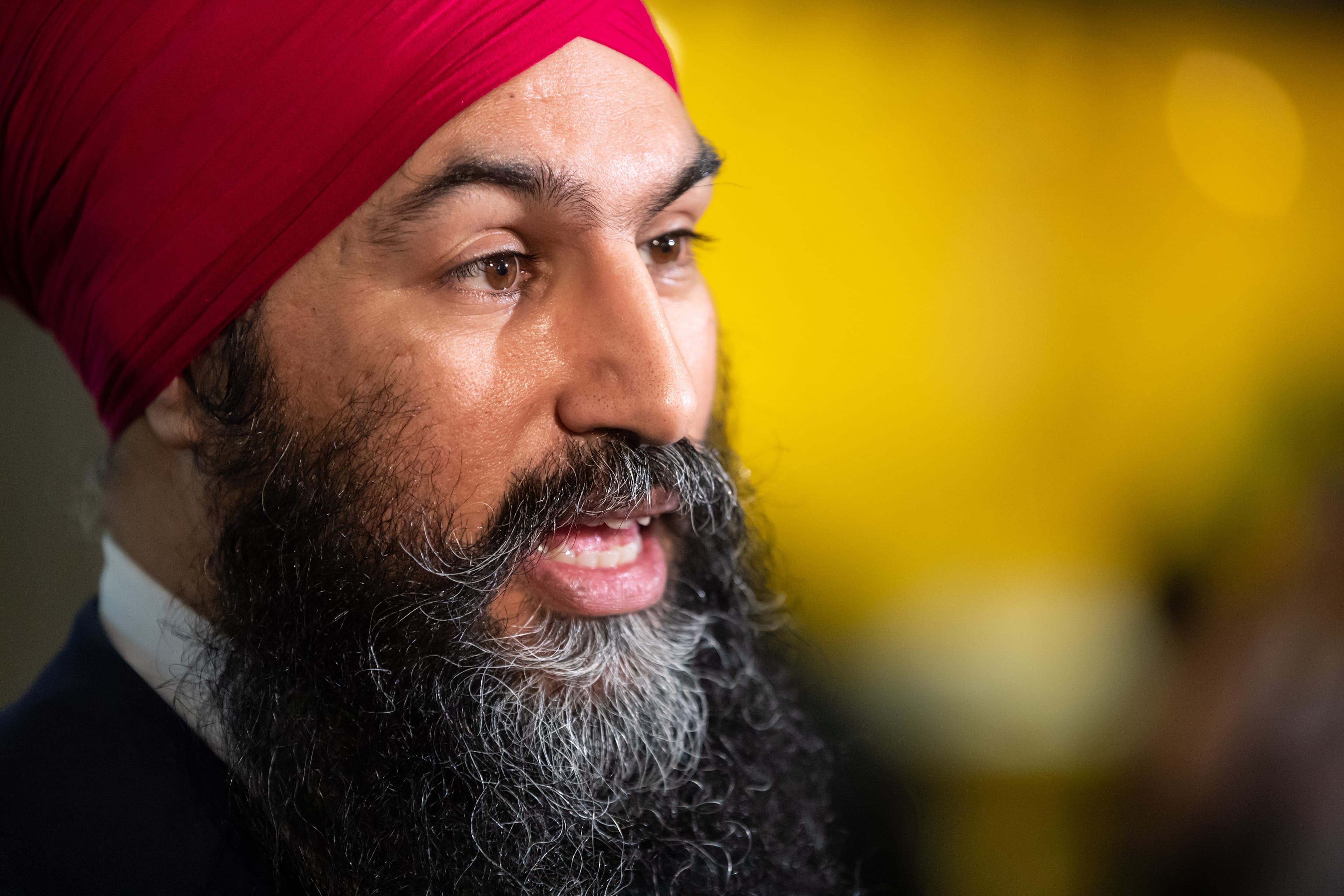 NDP Leader Jagmeet Singh responds to questions while campaigning for the federal by-election in Burnaby, B.C., on Sunday, Feb. 24, 2019. (THE CANADIAN PRESS/Darryl Dyck)
