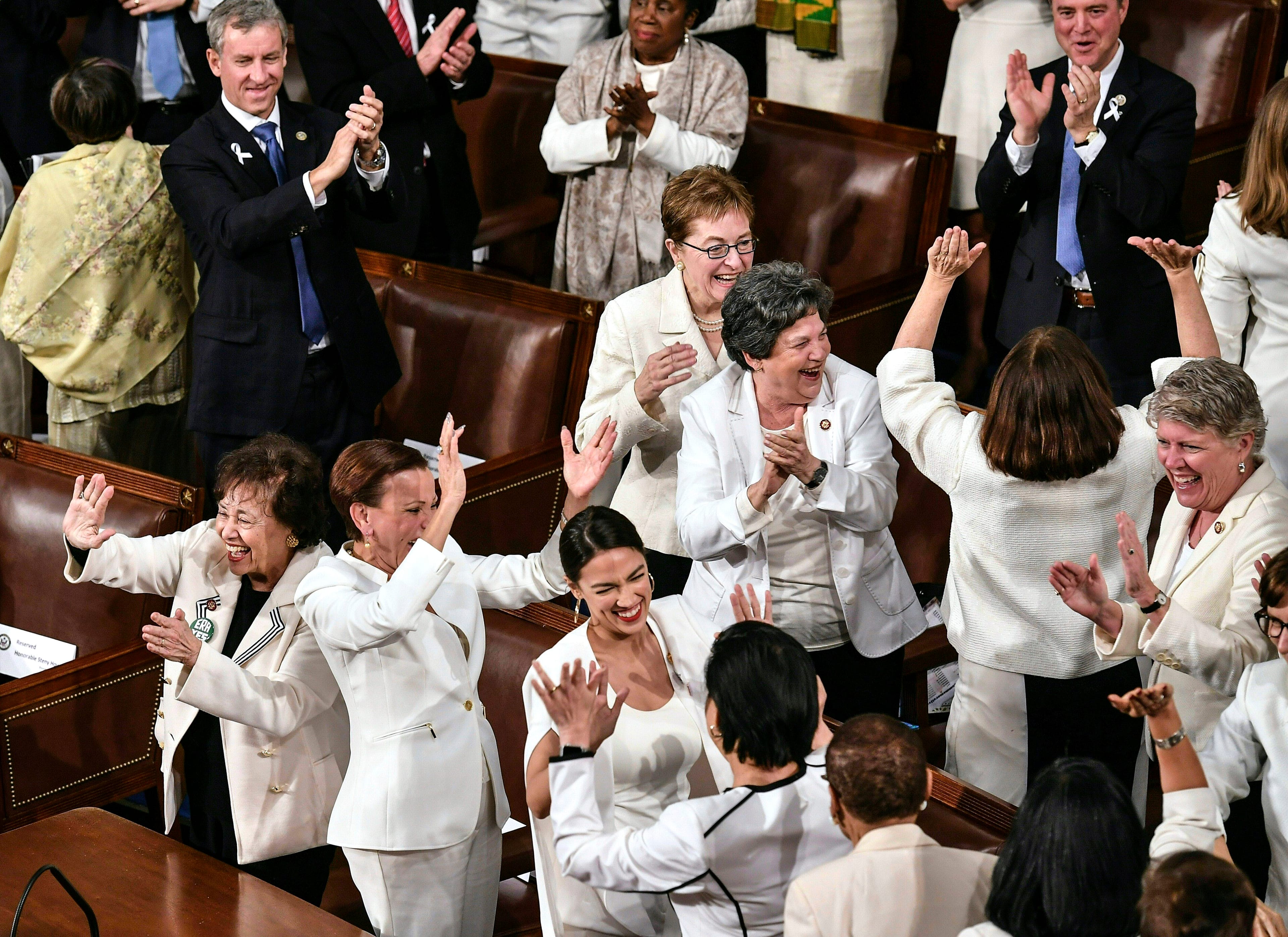 Lawmakers react to Trump's acknowledgement of an increased presence of women on Capitol Hill during his State of the Union address in Washington, on Feb. 5, 2019. (MANDEL NGAN/AFP/Getty Images)