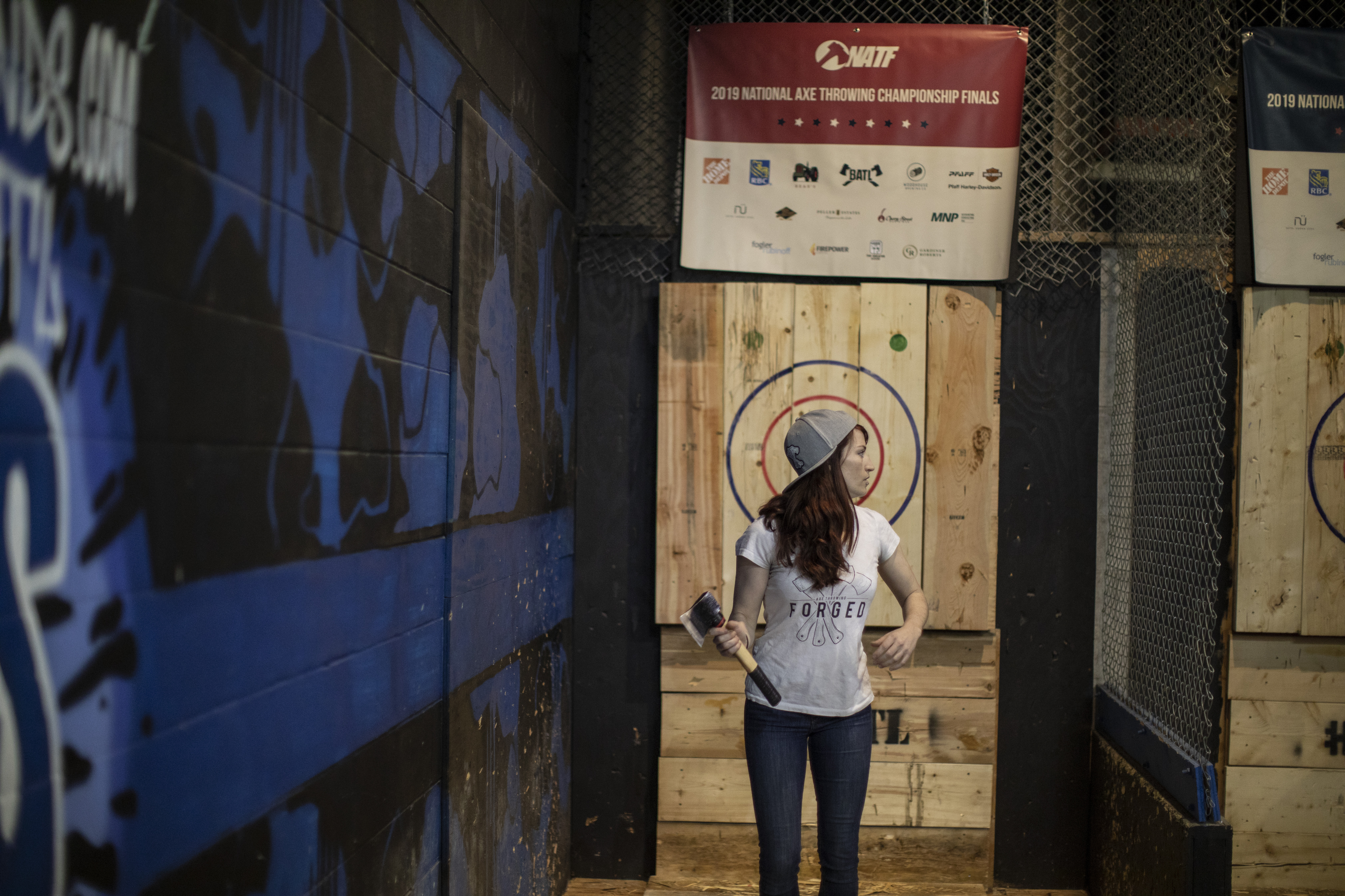 Krista Mackie, of Whistler, B.C., during the National Axe Throwing Championship at BATL Pickering, Feb. 17, 2019. (Photo by Nick Iwanyshyn)