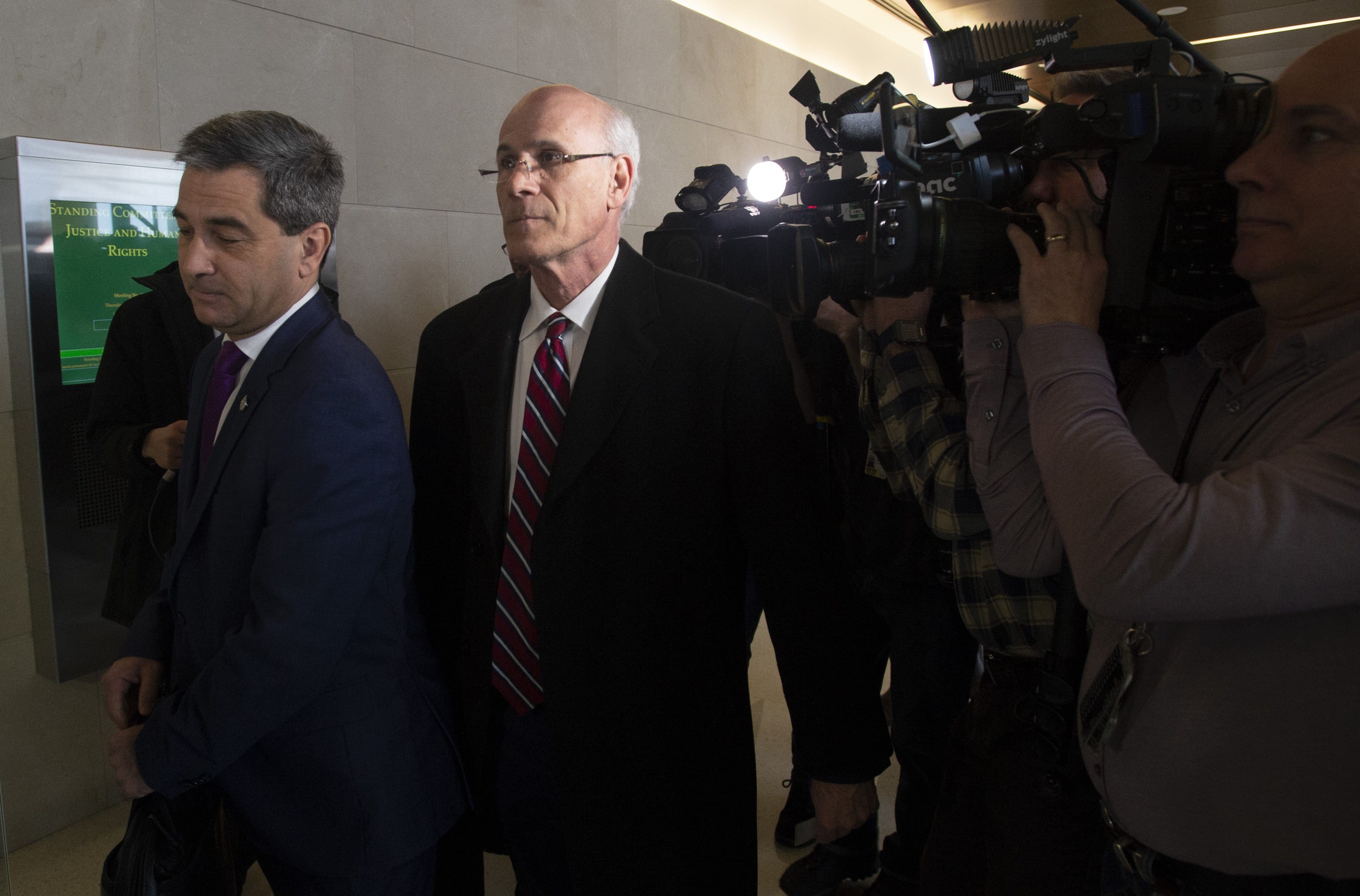 Conservative MP Pierre Paul-Hus (left) and Clerk of the Privy Council Michael Wernick make their way to the Justice Committee meeting in Ottawa, Thursday February 21, 2019. THE CANADIAN PRESS/Adrian Wyld