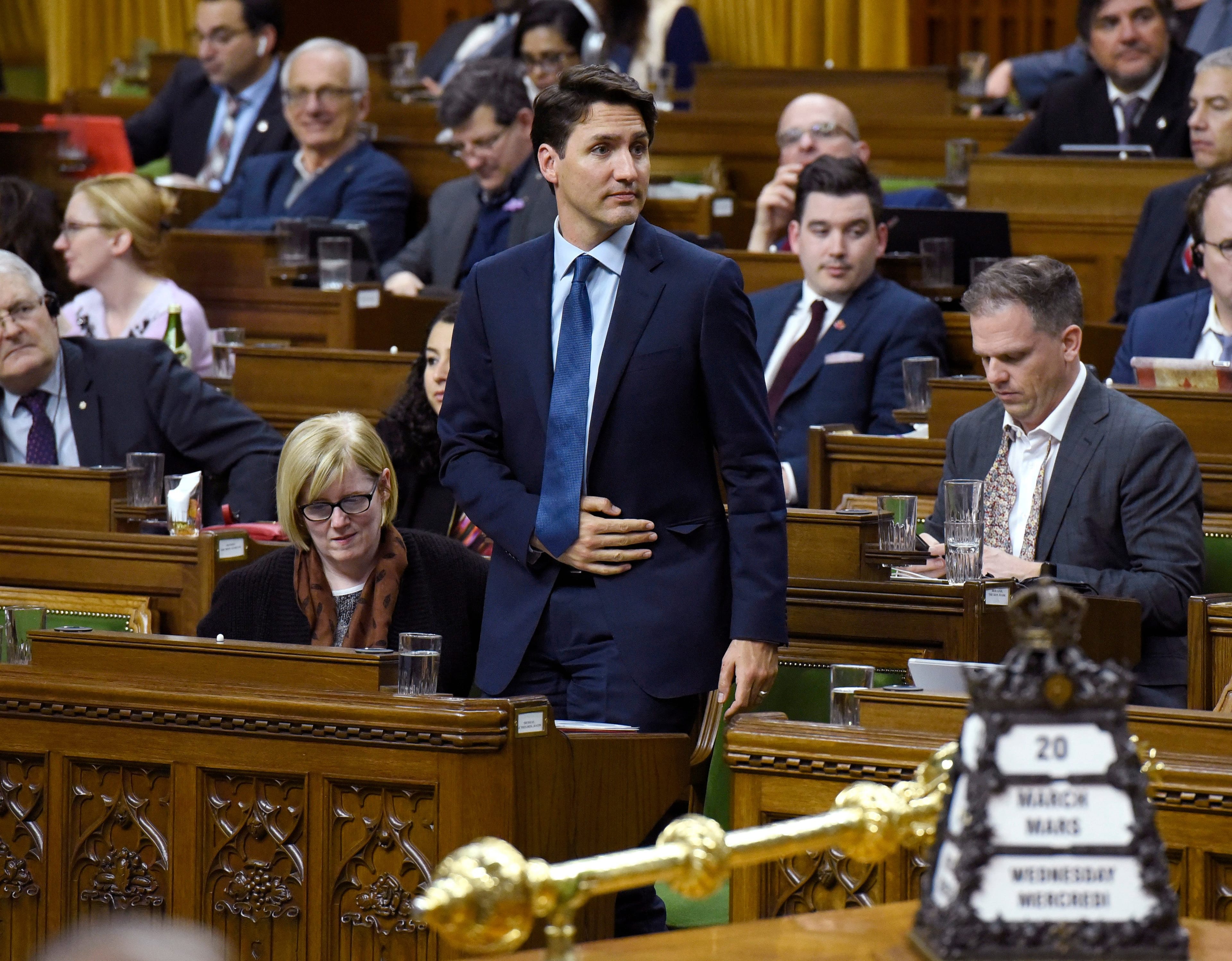 Trudeau rises to vote during a marathon session as it continues into its second night in the House of Commons on Thursday, March 21, 2019. (THE CANADIAN PRESS/Justin Tang)