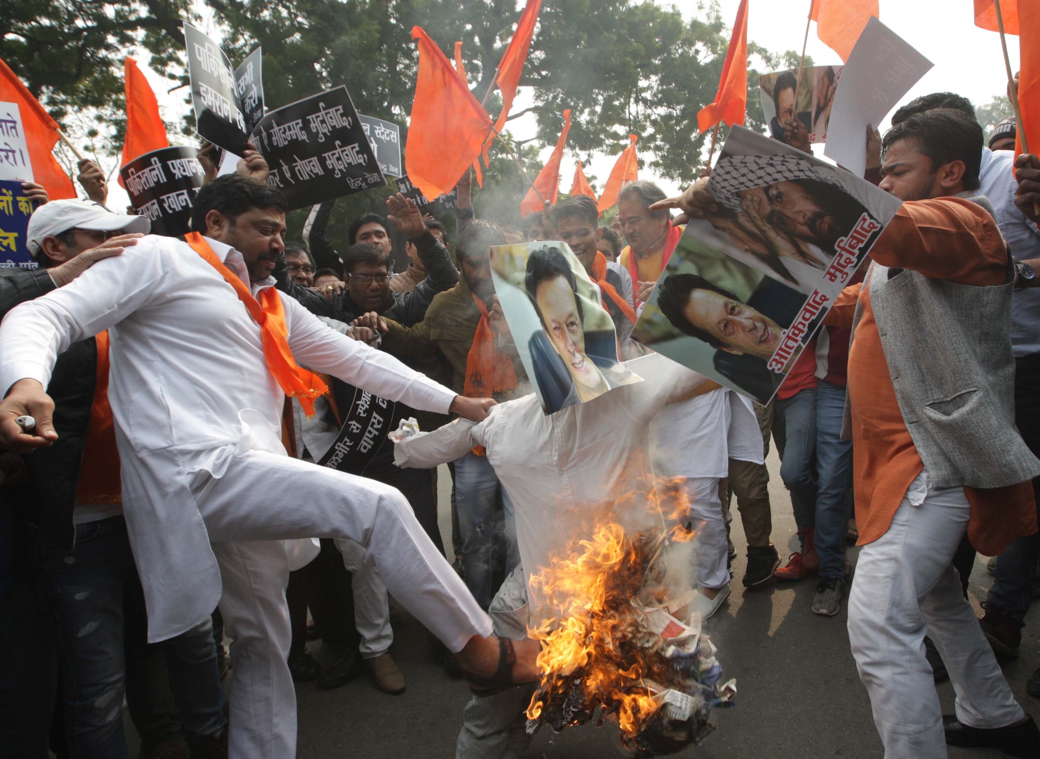 Hindu Sena supporters burn the effigies of the chief of the Jaish-e-Mohammad and Pakistan's PM to protest the terror attack in Pulwama (Pankaj Nangia/India Today Group/Getty Images)