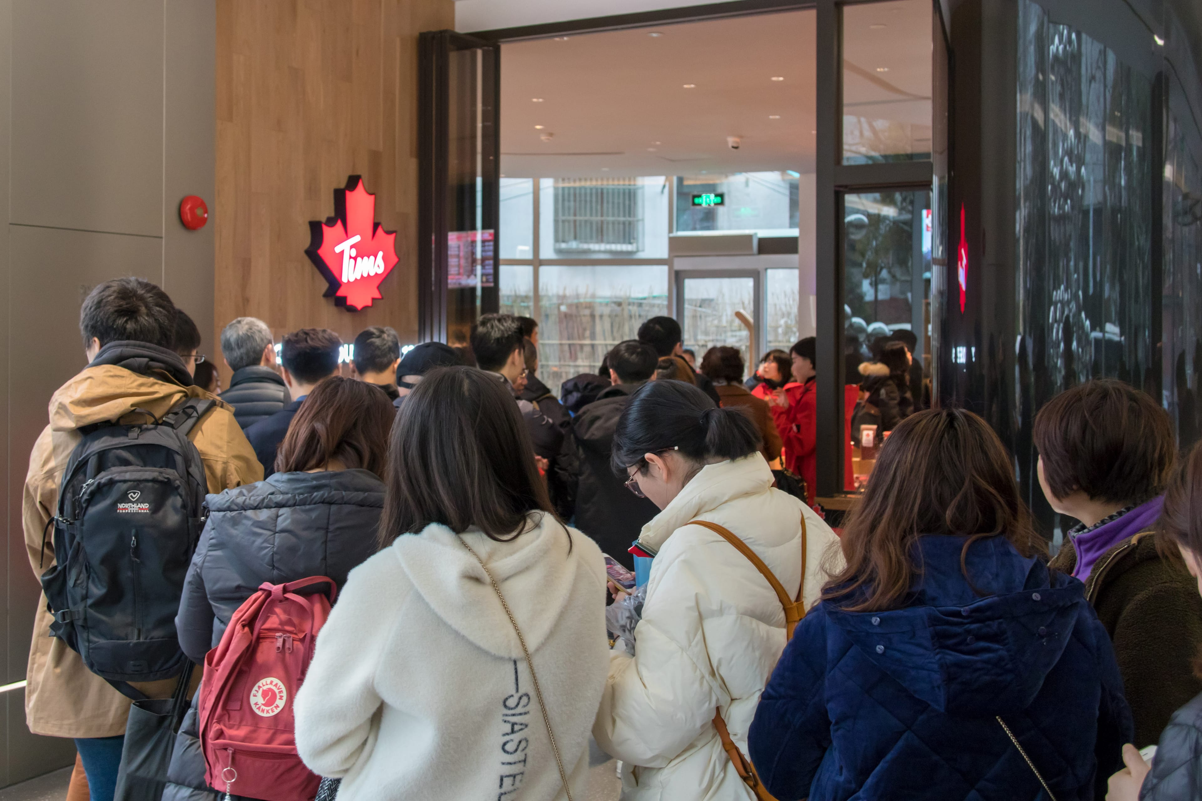 Customers crowd a Tim Hortons coffee house on Tuesday at Shanghai's Central Plaza—the first Tim's on the Chinese mainland (Wang Gang/VCG/Getty Images)
