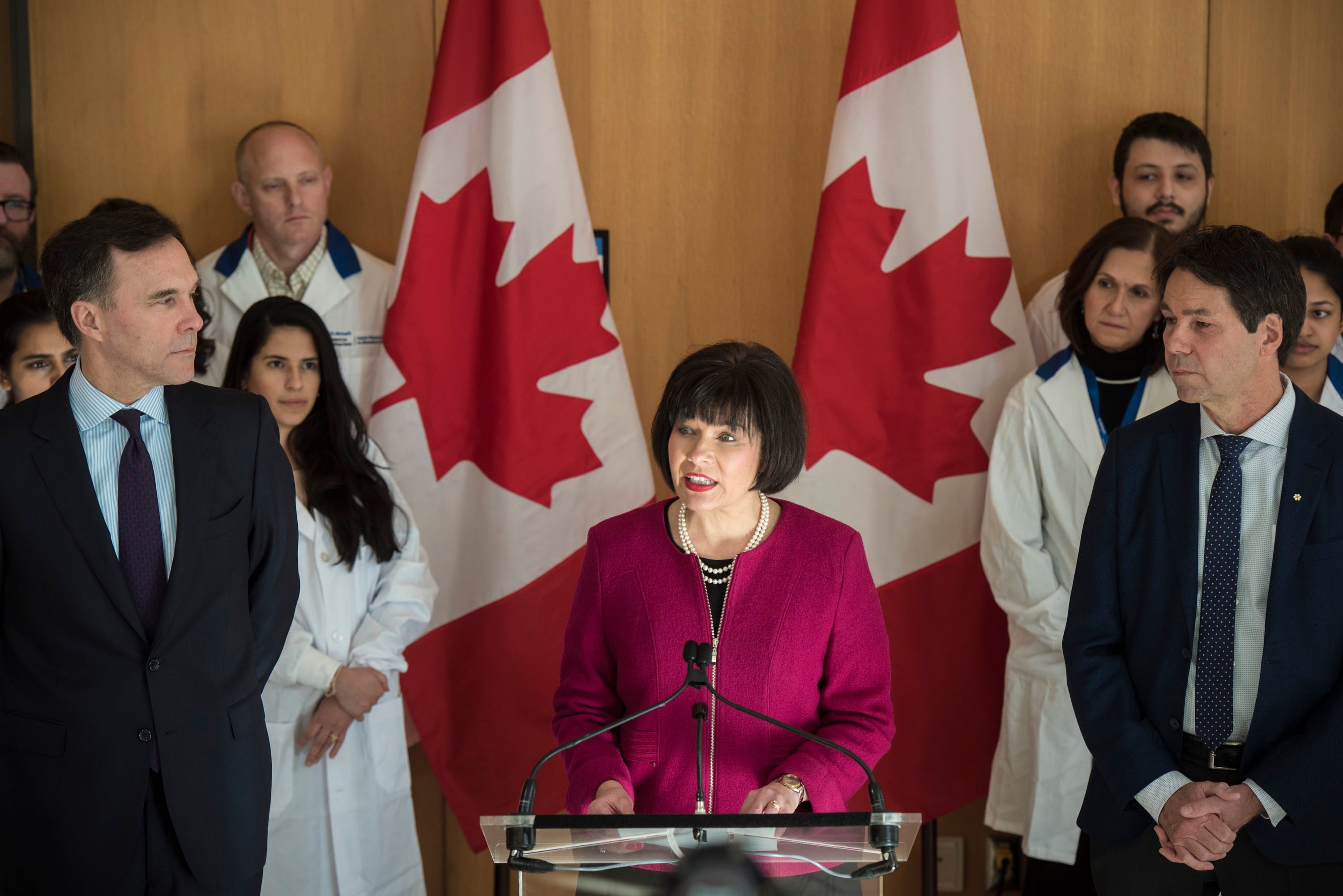 Bill Morneau, Minister of Finance, left to right, Ginette Petitpas Taylor, federal Minister of Health and Dr. Eric Hoskins, Chair of the Advisory Council on the Implementation of National Pharmacare, during a press conference on the national pharmacare program at the Li Ka Shing Knowledge Institute in Toronto on Wednesday, March 6, 2019. THE CANADIAN PRESS/ Tijana Martin