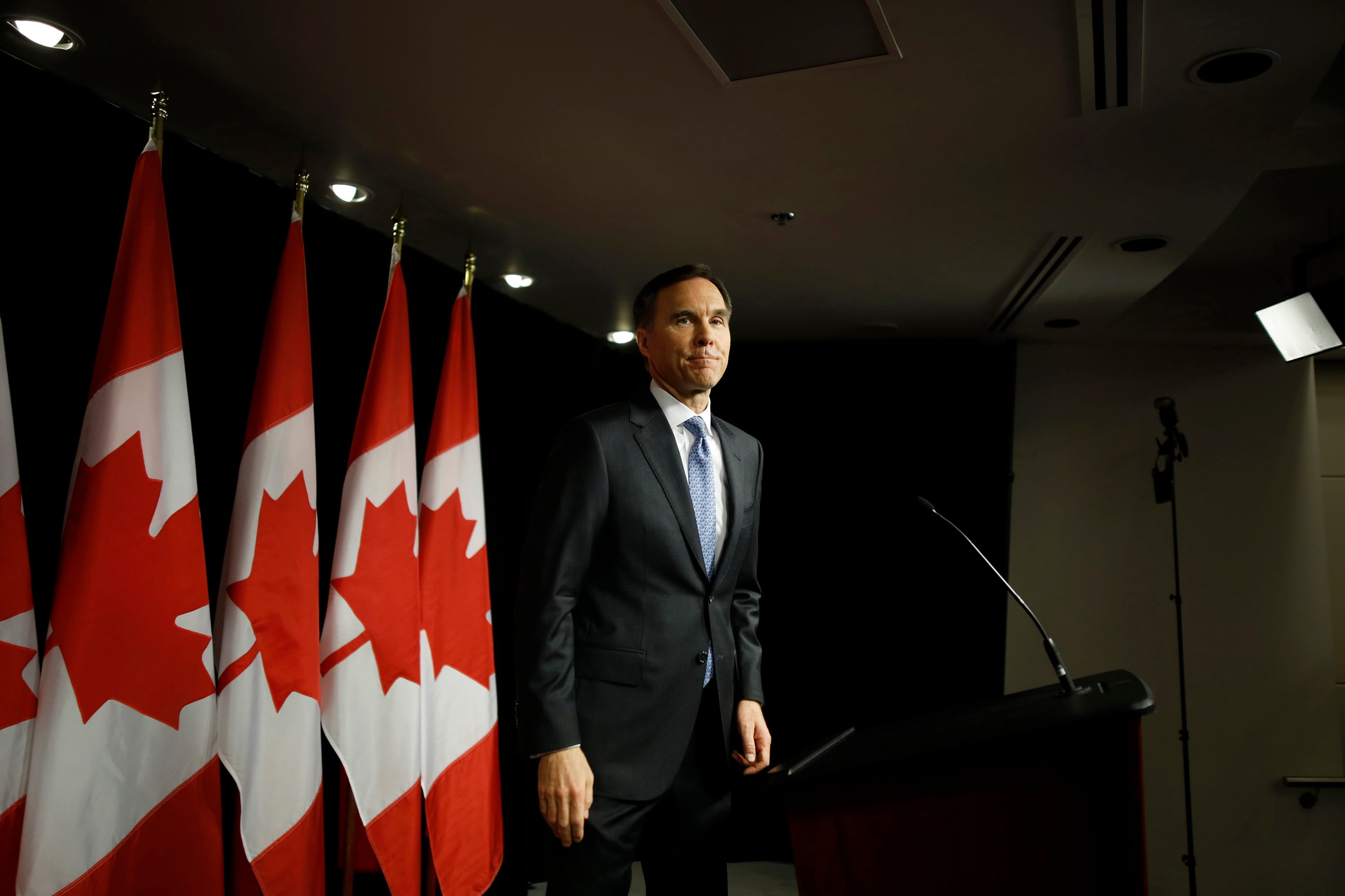 Finance Minister Bill Morneau speaks to reporters in Ottawa on March 19, 2019. (Photograph by Blair Gable)