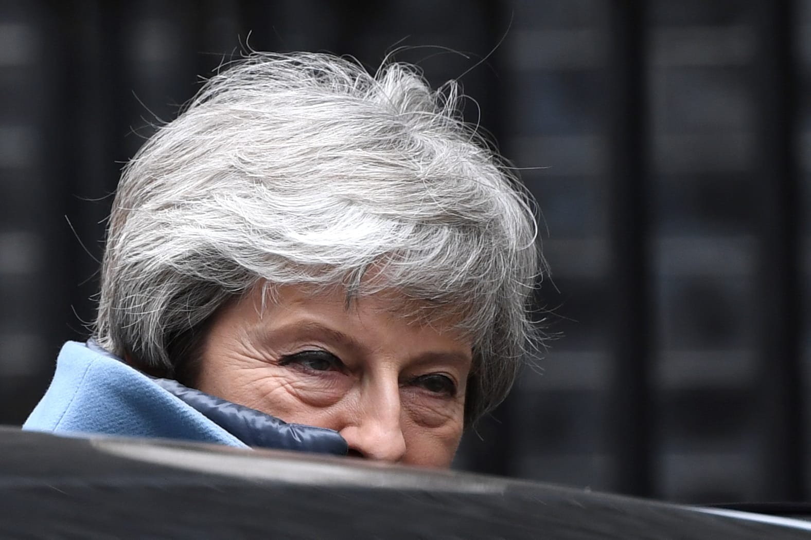 May leaves 10 Downing Street for the weekly Prime Minister Question session in the House of Commons in London. (Paul Ellis/AFP/Getty)