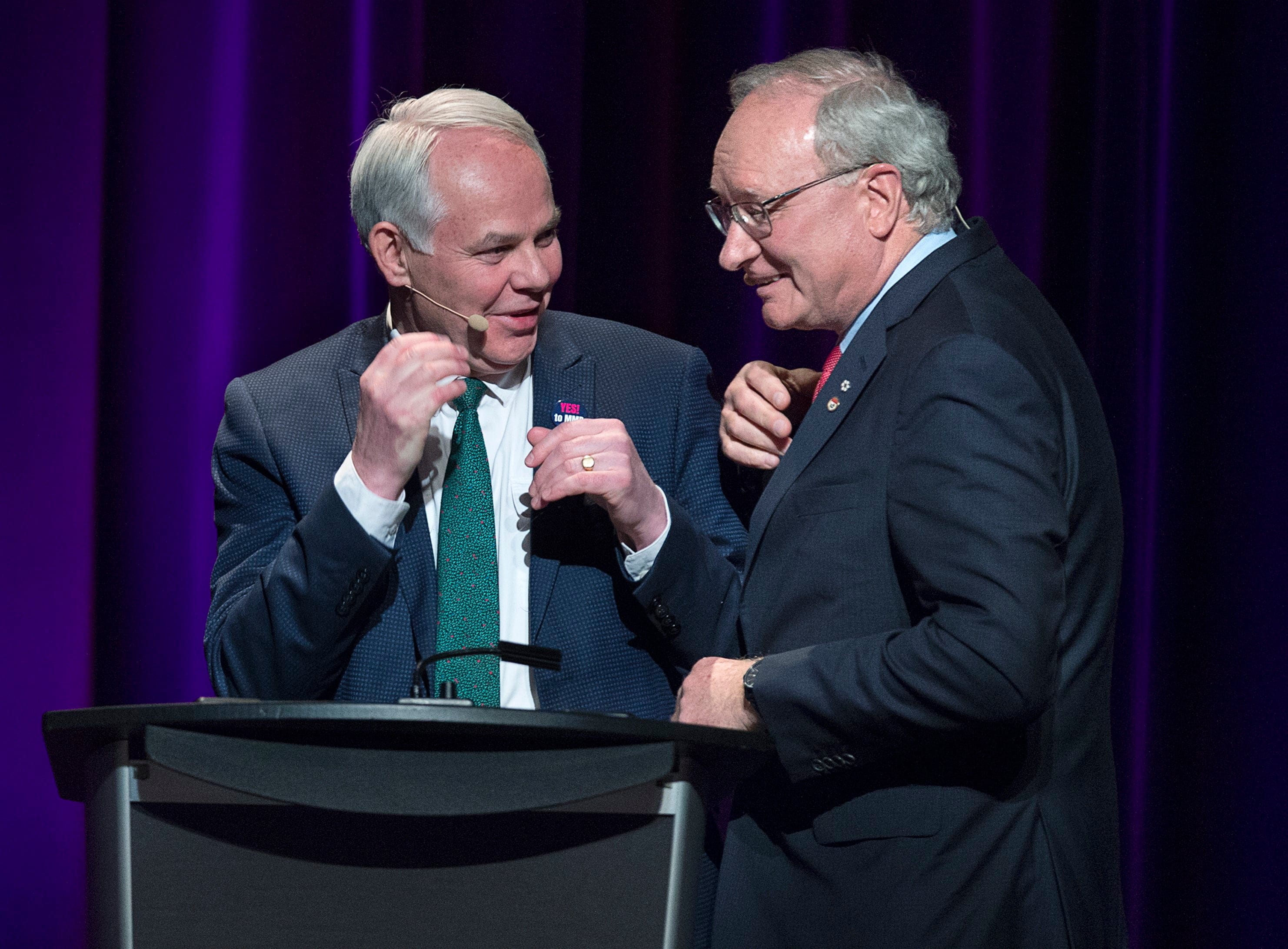 Green Leader Peter Bevan-Baker, left, and Liberal Leader Wade MacLauchlan chat at the end of the provincial leaders debate at the Harbourfront Theatre in Summerside, P.E.I. on Tuesday, April 16, 2019. (Andrew Vaughan/CP)