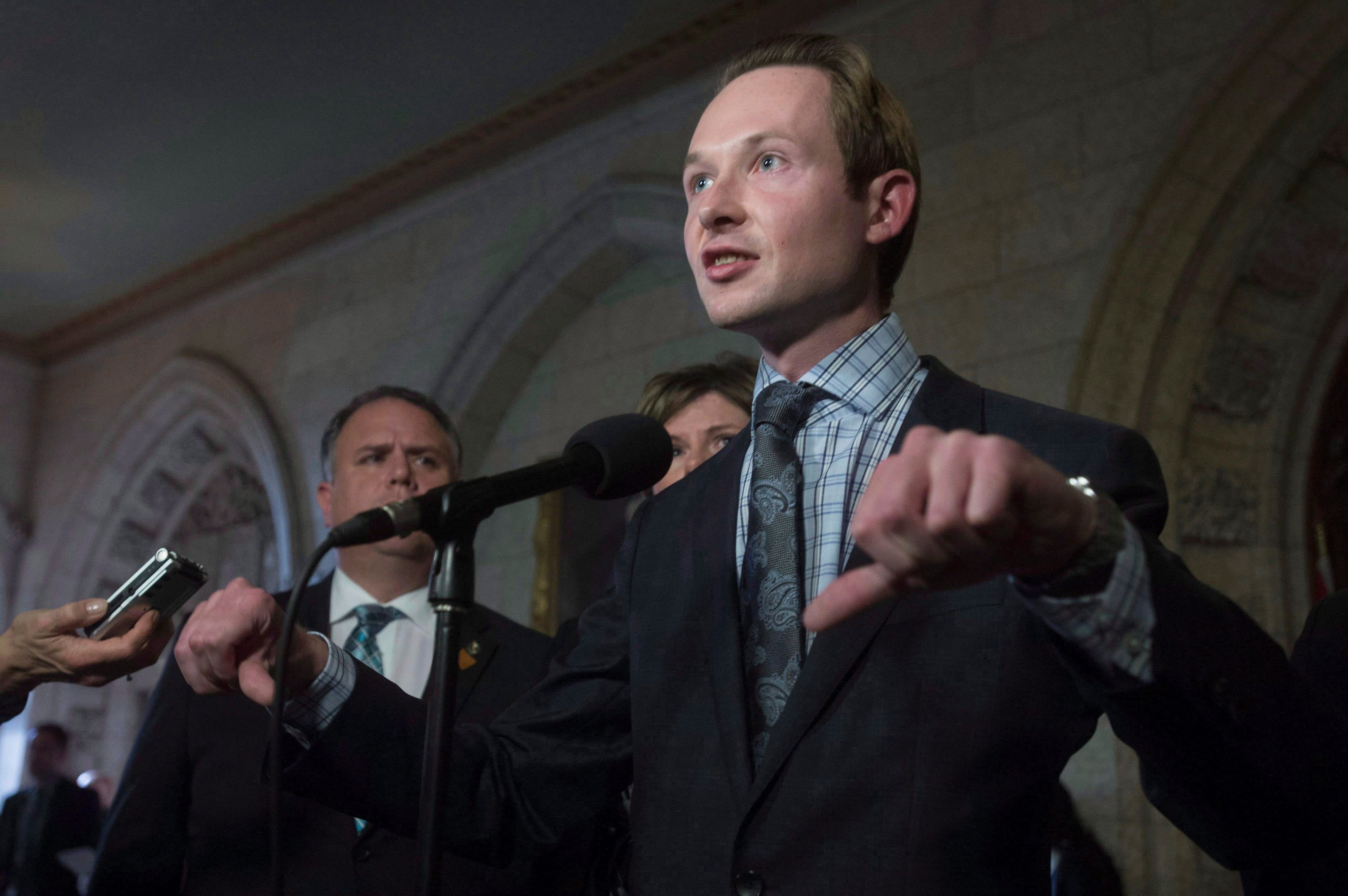 Cooper talks to reporters after Question Period in the House of Commons, on Oct. 6, 2016 (THE CANADIAN PRESS/Adrian Wyld)