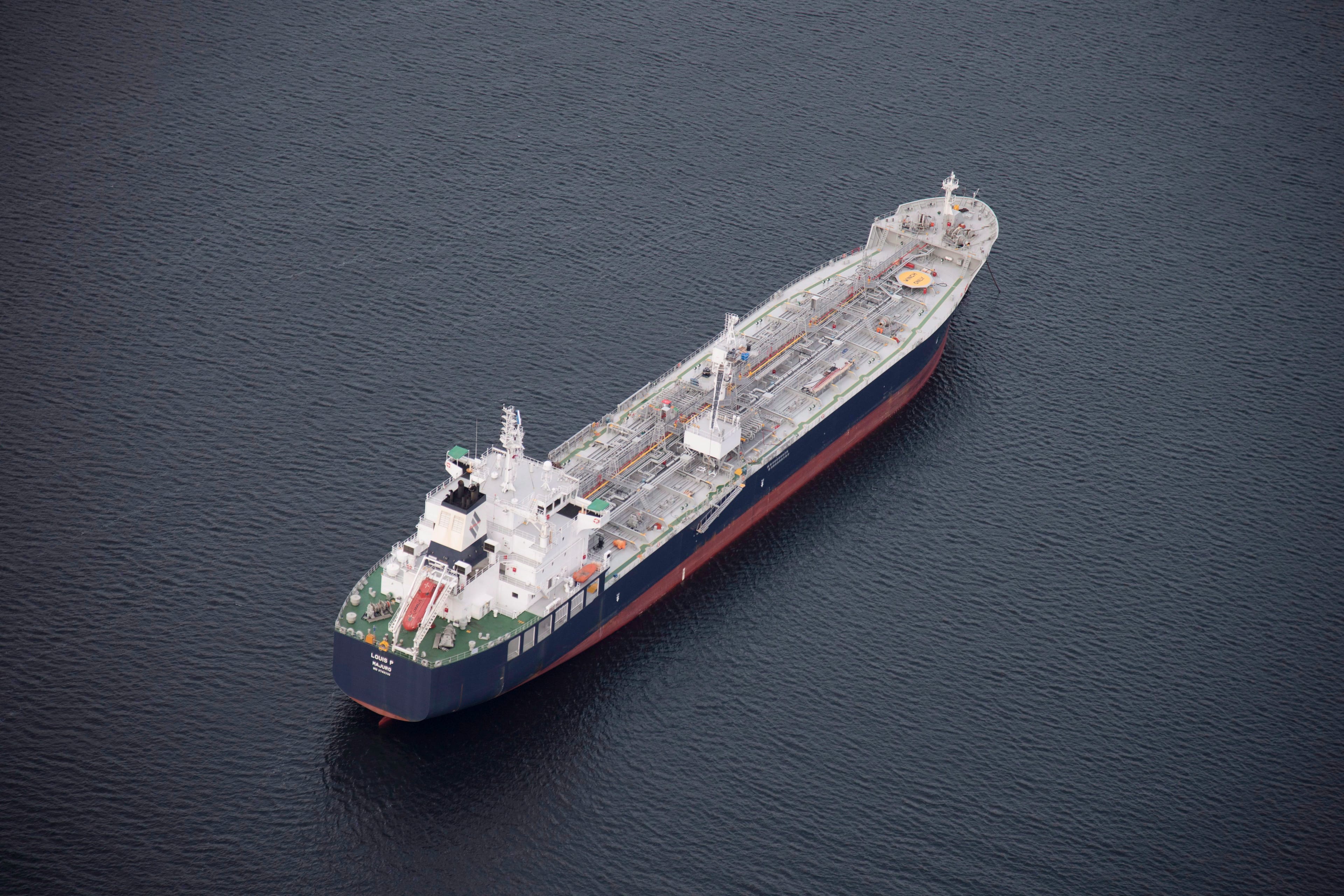 A tanker is anchored in Burrard Inlet just outside of Burnaby, B.C., on Friday, Nov. 25, 2016. (Jonathan Hayward/CP)