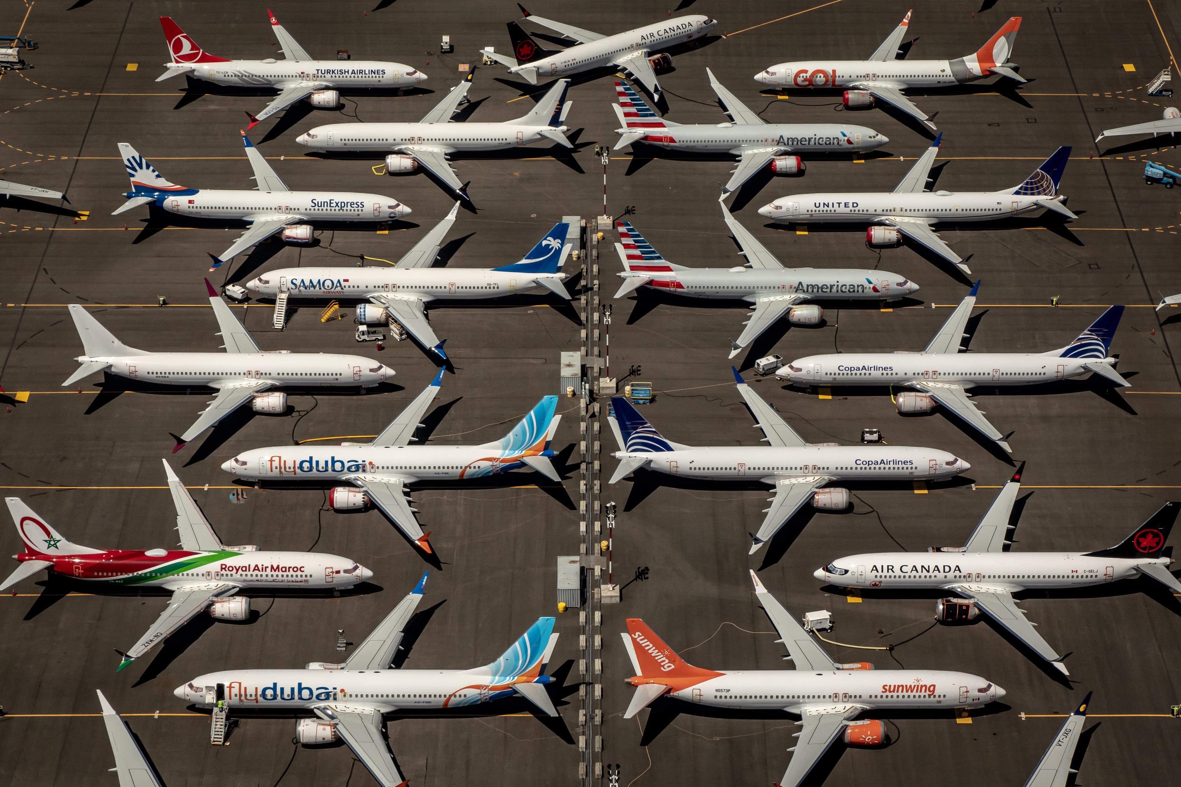 Boeing 737 Max 8 aircraft sit parked at Boeing Field in Seattle, Washington, USA, 21 July 2019. The Boeing 737 Max 8 was grounded by aviation regulators and airlines around the world in March 2019 after 346 people were killed in two crashes. (Gary He/EPA)