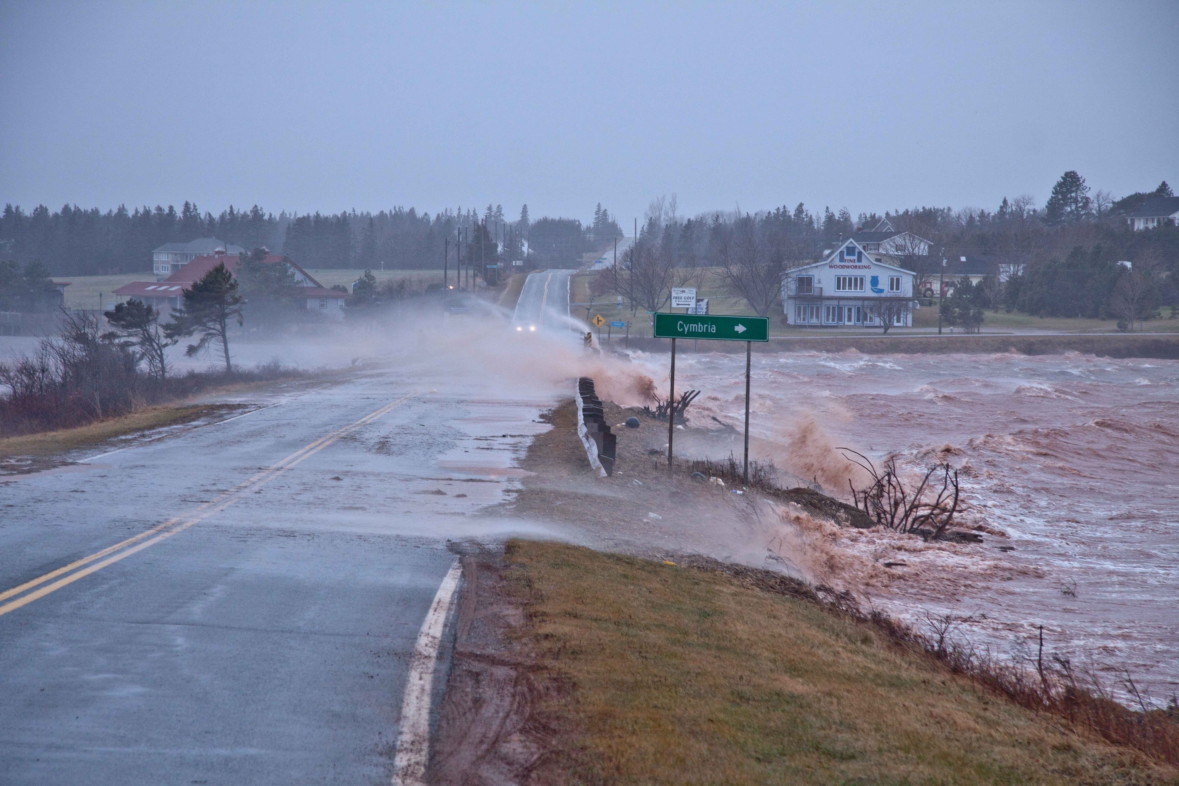 From sea to sea to sea, Canadians face destructive and mercurial weather, including storm surges like this one clobbering P.E.I.’s Oyster Bed Bridge (Don Jardine)