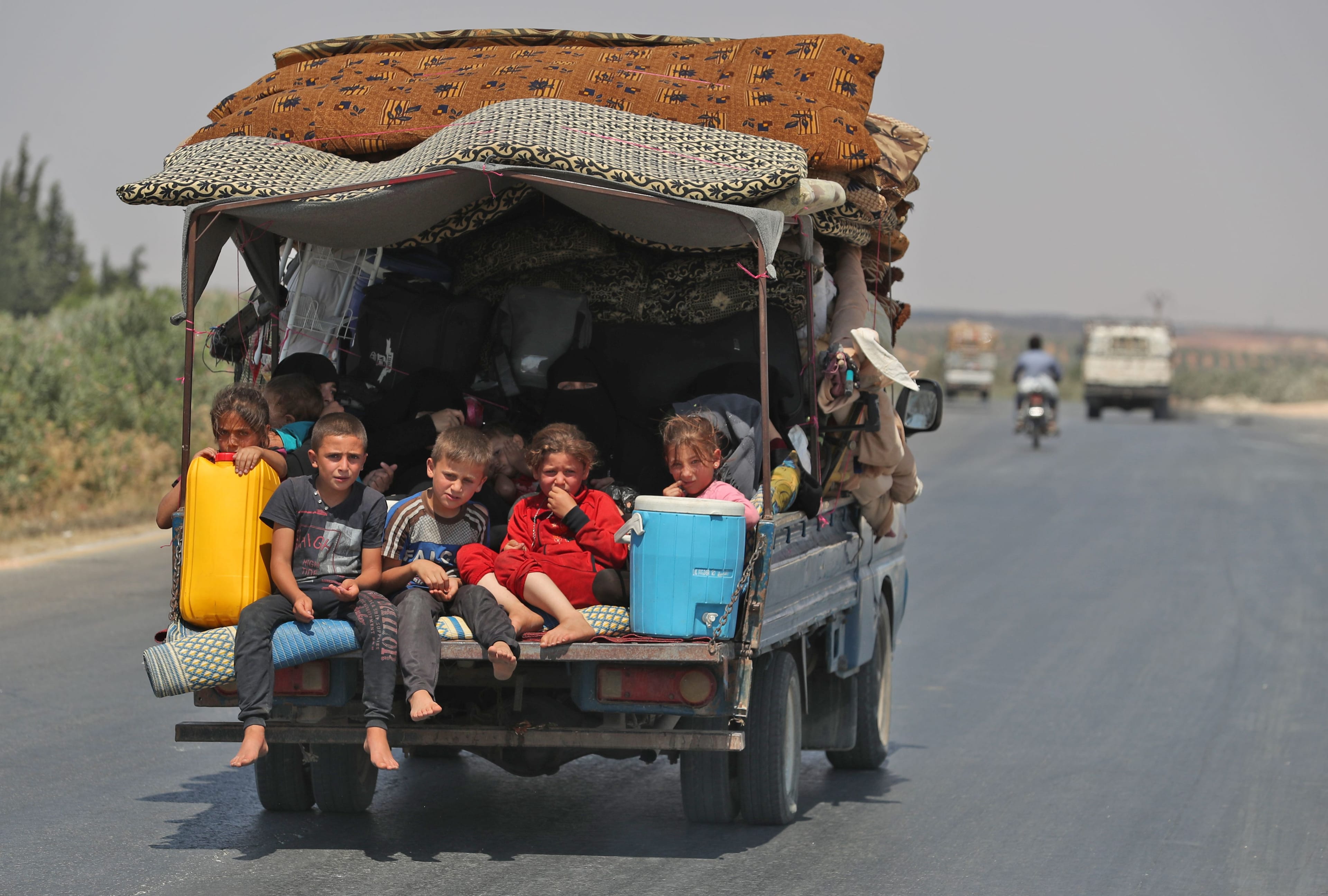 Syrian civilians flee Idlib  on Aug. 22, 2019. Government bombardments have killed hundreds there since late April (OMAR HAJ KADOUR/AFP/Getty Images)