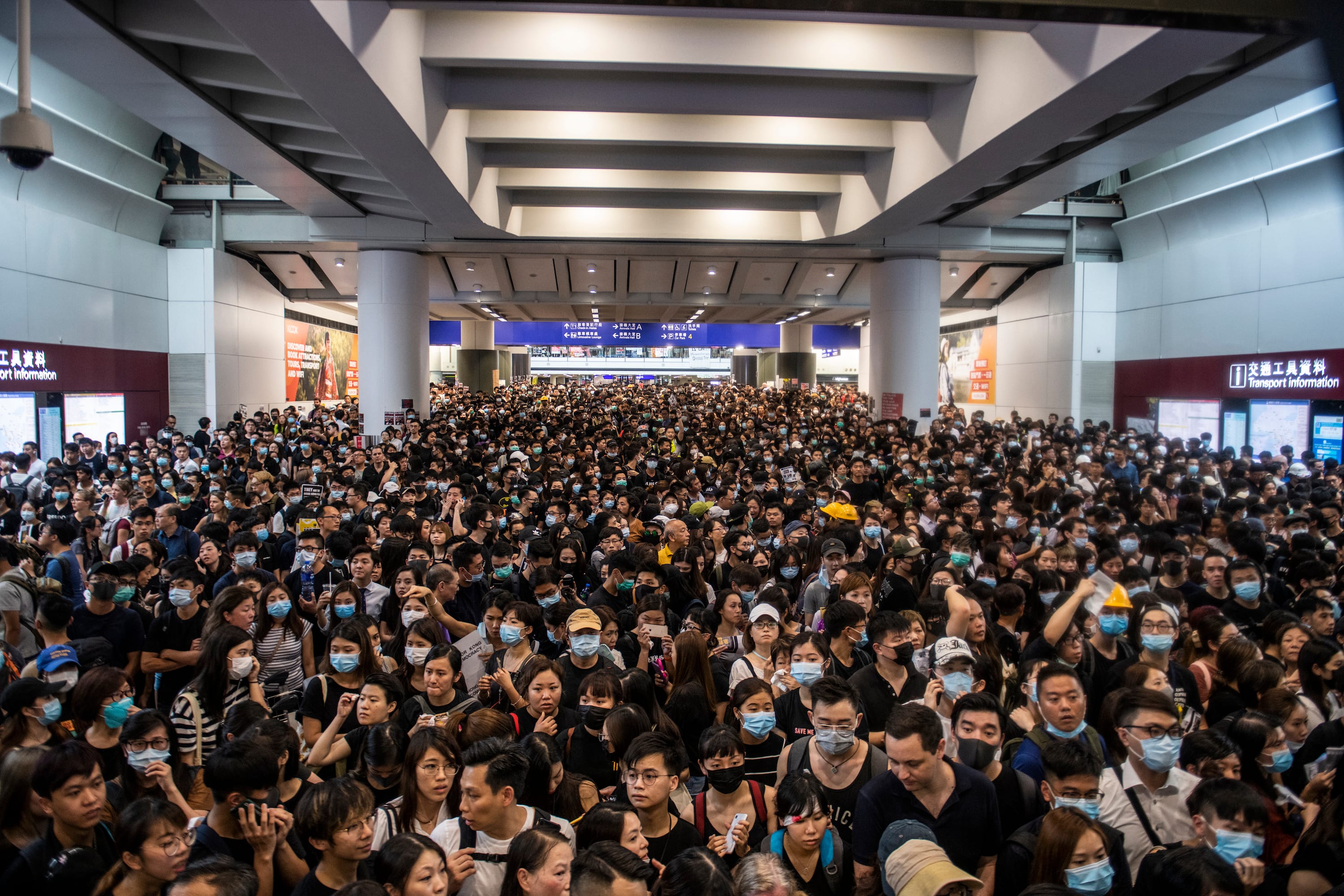 Protester are seen in Hong Kong International Airport in Hong Kong on August 12, 2019 , Tens of Thousands Protester are seen gather in Hong Kong international airport in protest of Police Brutally and the extradition bill -- Protester Clash with Police yesterday in Hong Kong -- Hong Kong International Airport suspended Flight Operation at at 15:45 Local Time Today. (Vernon Yuen/NurPhoto)