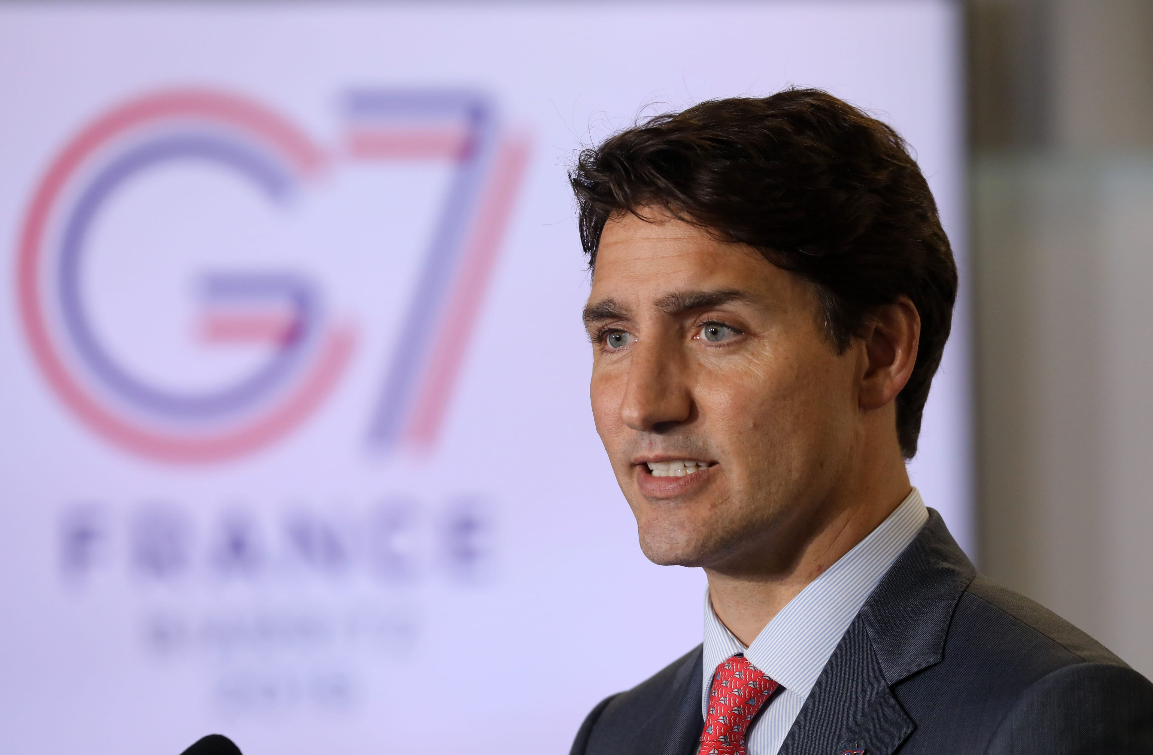 Prime Minister Justin Trudeau addresses media representatives at a press conference in Biarritz, south-west France on Aug. 26, 2019. (LUDOVIC MARIN/AFP/Getty Images)