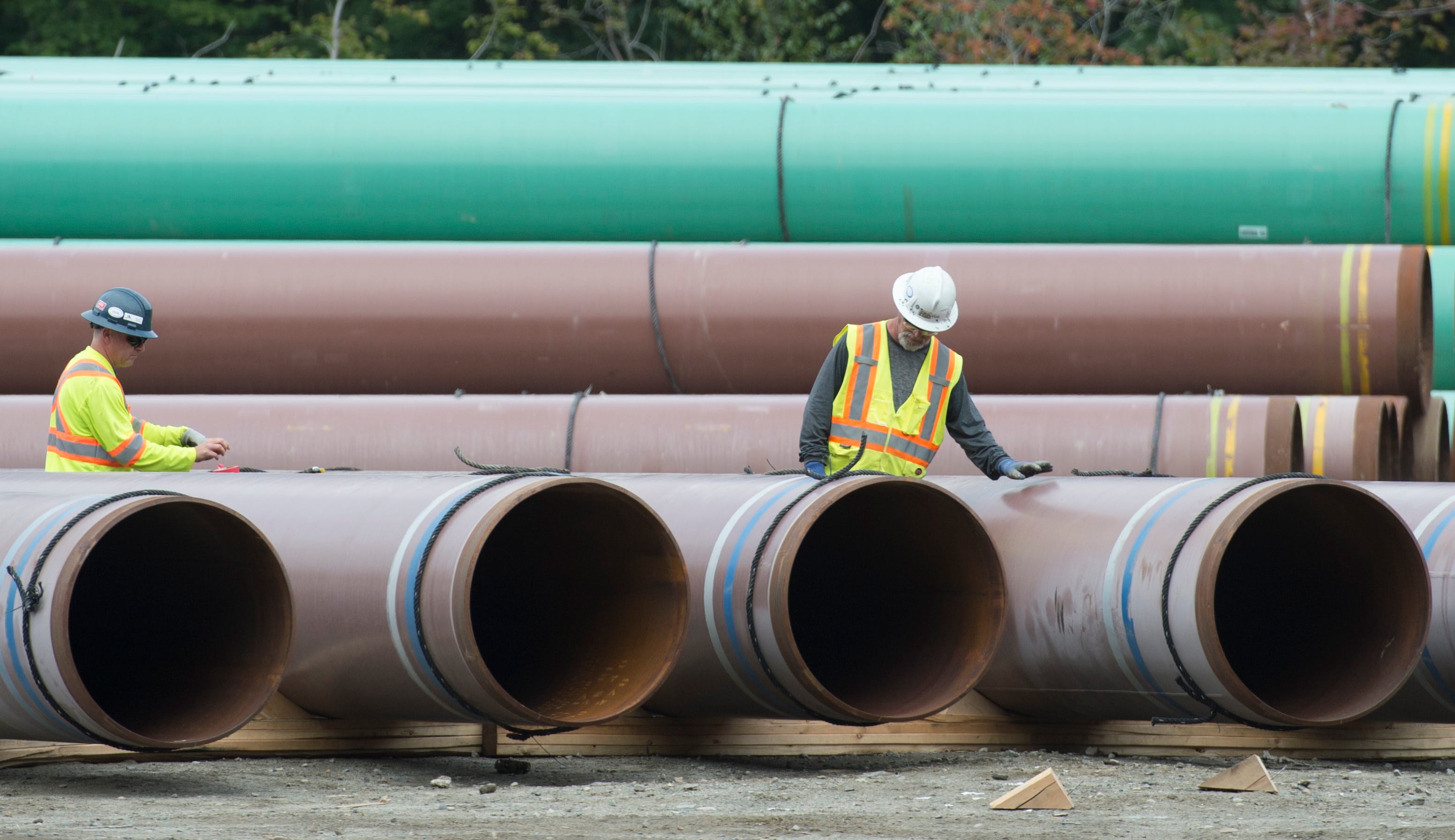 Pipeline segments at a Trans Mountain facility near Hope, B.C., Aug. 22, 2019 (THE CANADIAN PRESS/Jonathan Hayward)