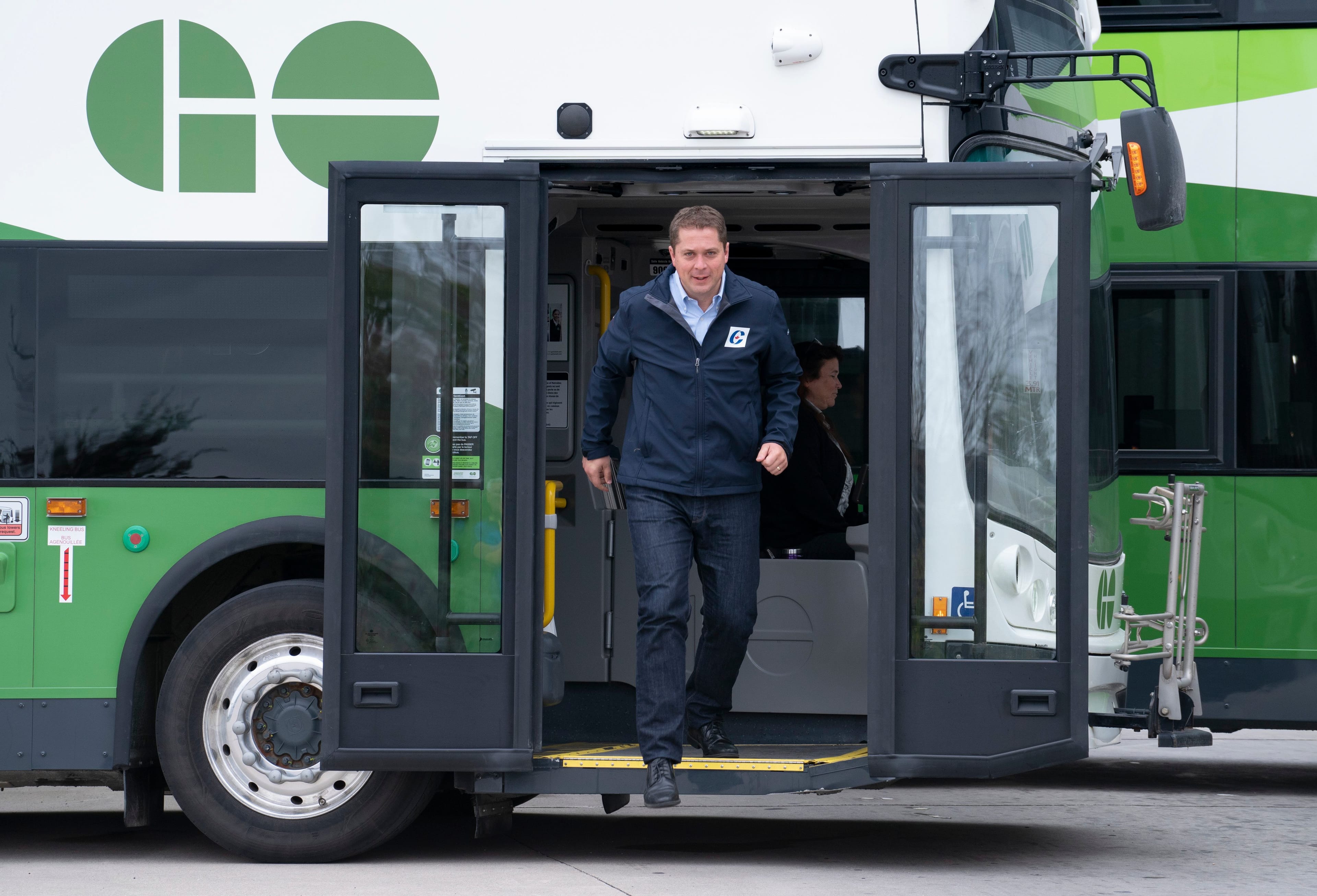 Conservative Leader Andrew Scheer steps off a  transit bus in Mississauga, Ont., on Sept. 13, 2019 (THE CANADIAN PRESS/Paul Chiasson)