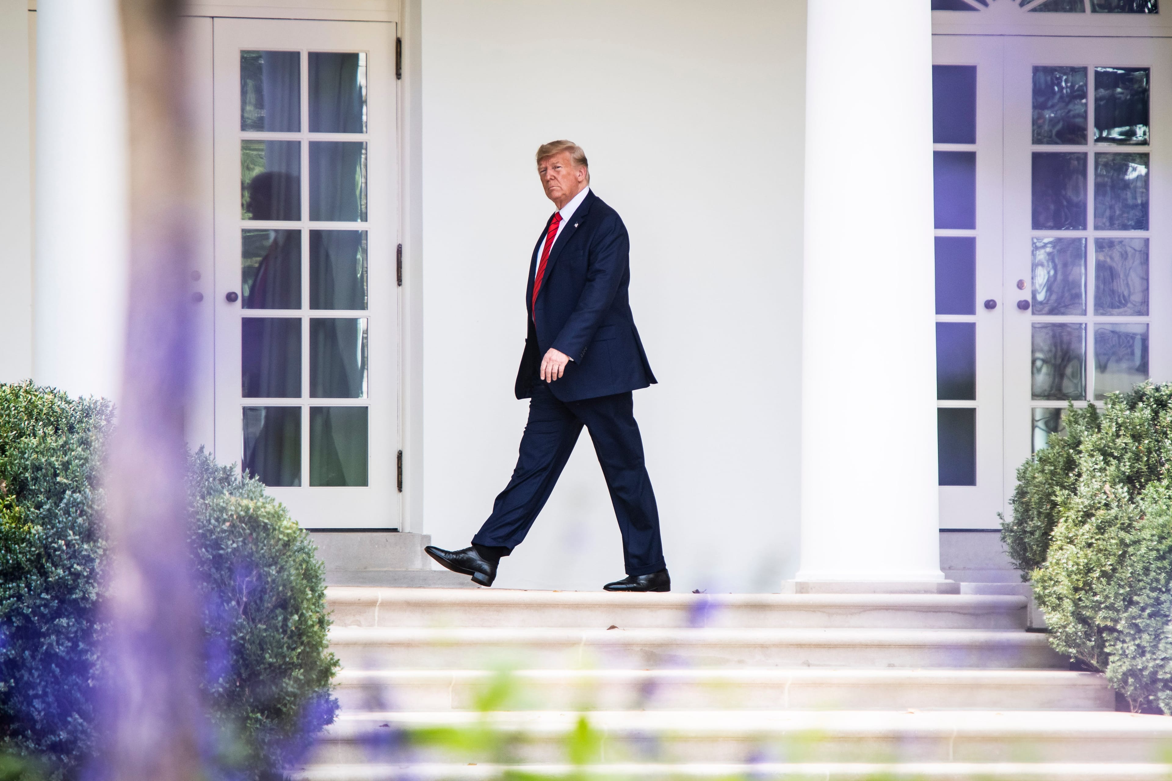 President Donald J. Trump walks along the Colonnade from Marine One to the Oval Office as he returns at the White House on Thursday, Sept 26, 2019 in Washington, DC. (Photo by Jabin Botsford/The Washington Post via Getty Images)