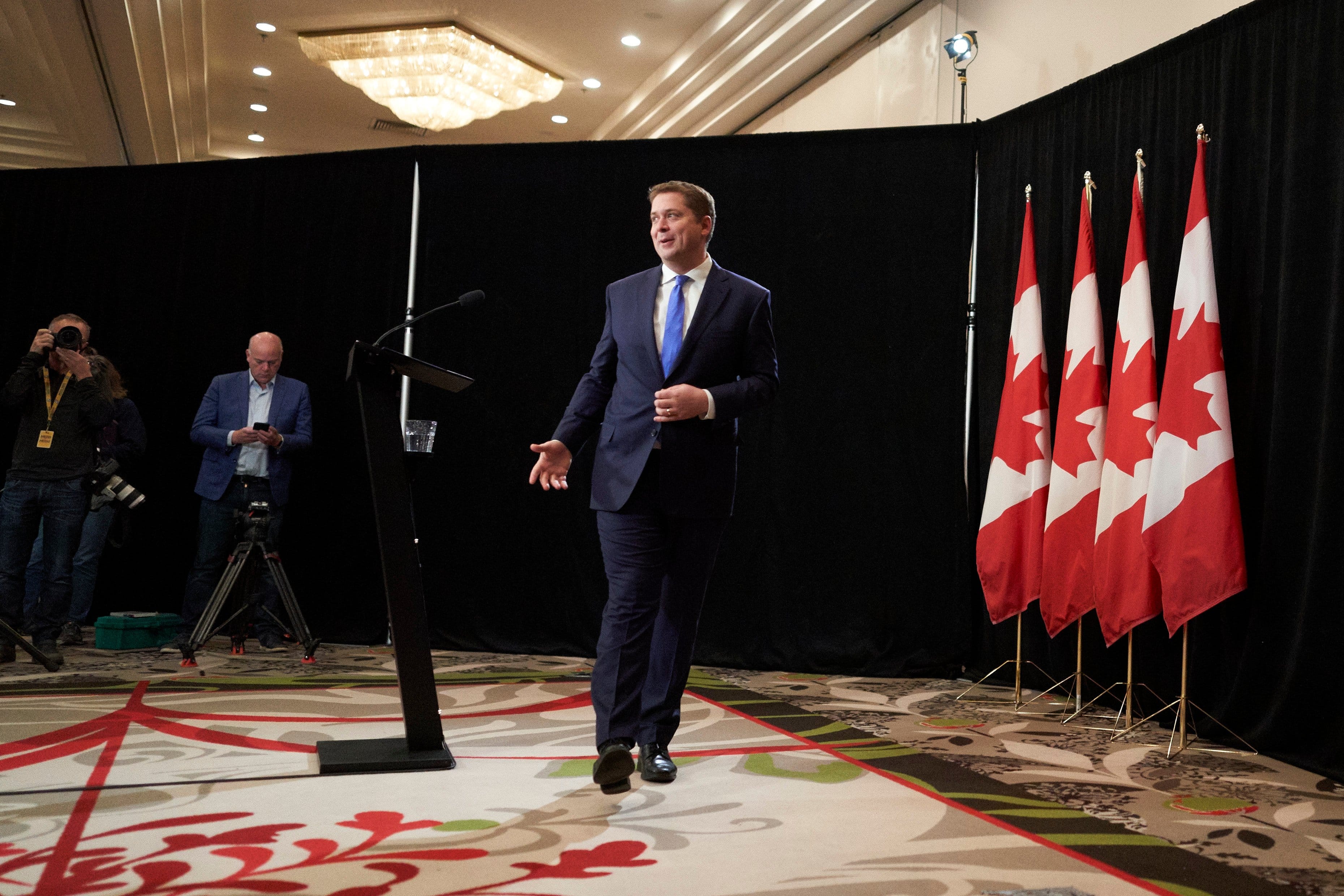 Scheer walks away following  a press conference in Regina on Oct. 22, 2019 (GEOFF ROBINS/AFP via Getty Images)
