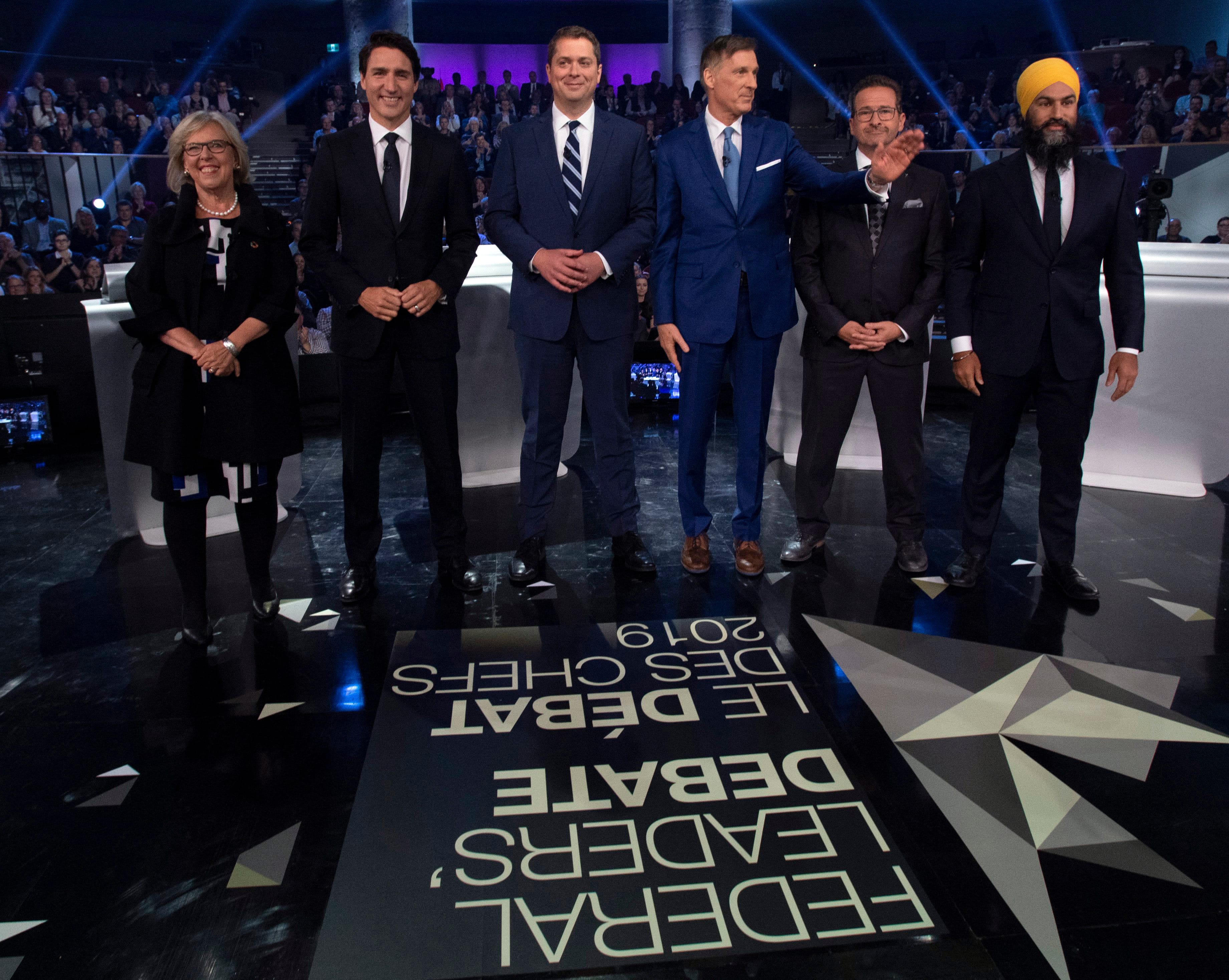 May, Trudeau, Scheer, Bernier, Blanchet and Singh pose for a photo before the Federal Leaders Debate on Oct. 7, 2019 (Adrian Wyld/CP)