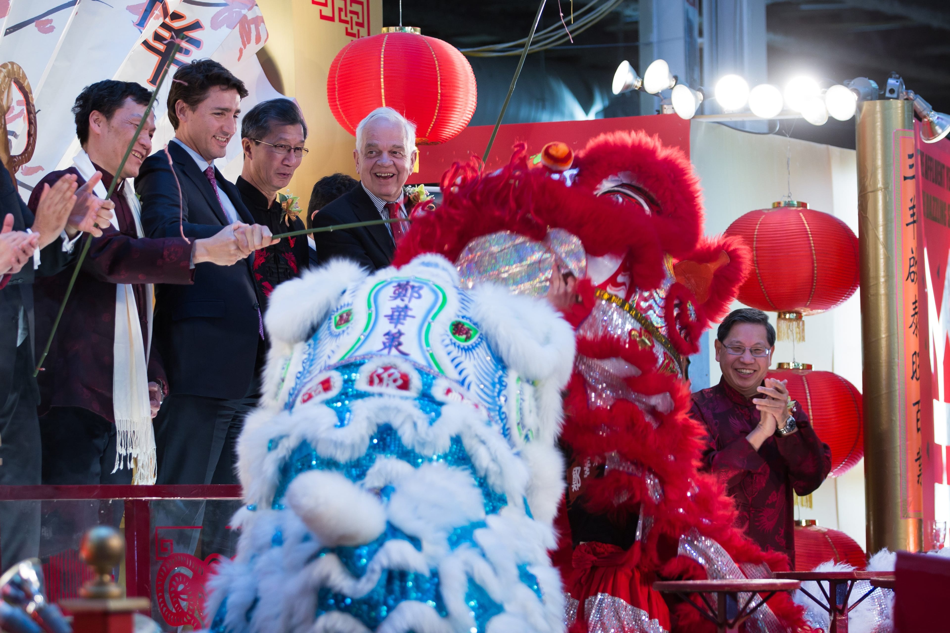 L-R: Liberal leader Justin Trudreau (2nd from left), MP Michael Chan, MP John McCallum drop in at the Pacific Mall in Markham-Unionville during the Chinese New Year on Feb. 19, 2015. (Adam Scotti/Liberal Party of Canada)