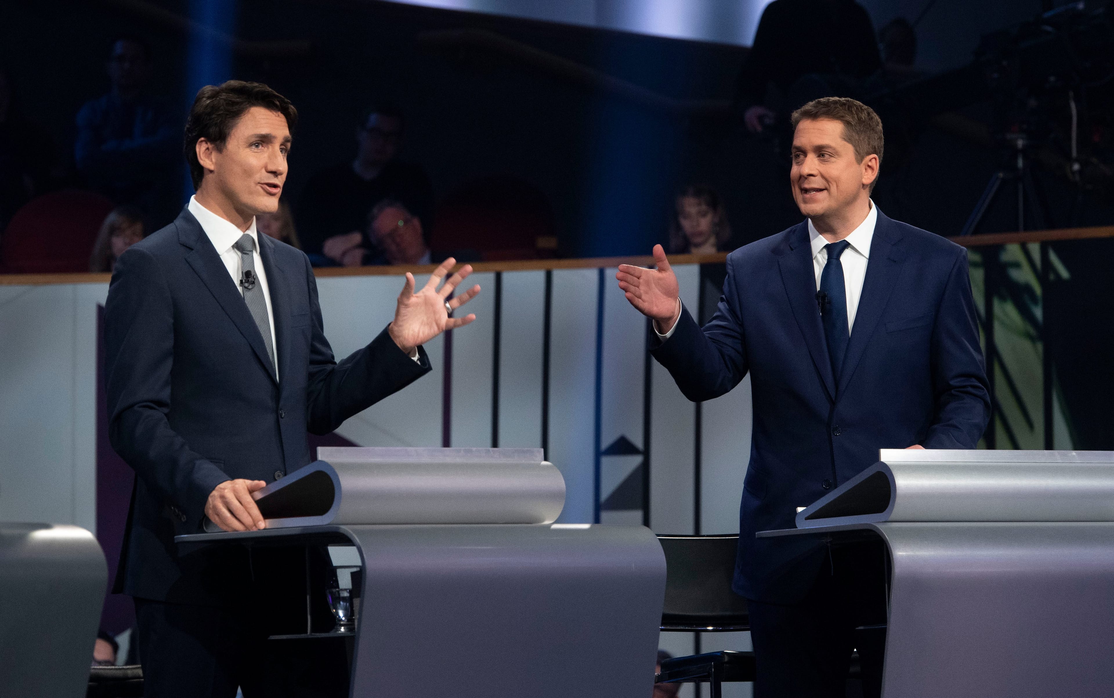 Liberal leader Justin Trudeau and Conservative leader Andrew Scheer take part in the the Federal leaders French language debate in Gatineau, Que. on Thursday, October 10, 2019. (Adrian Wyld/CP)