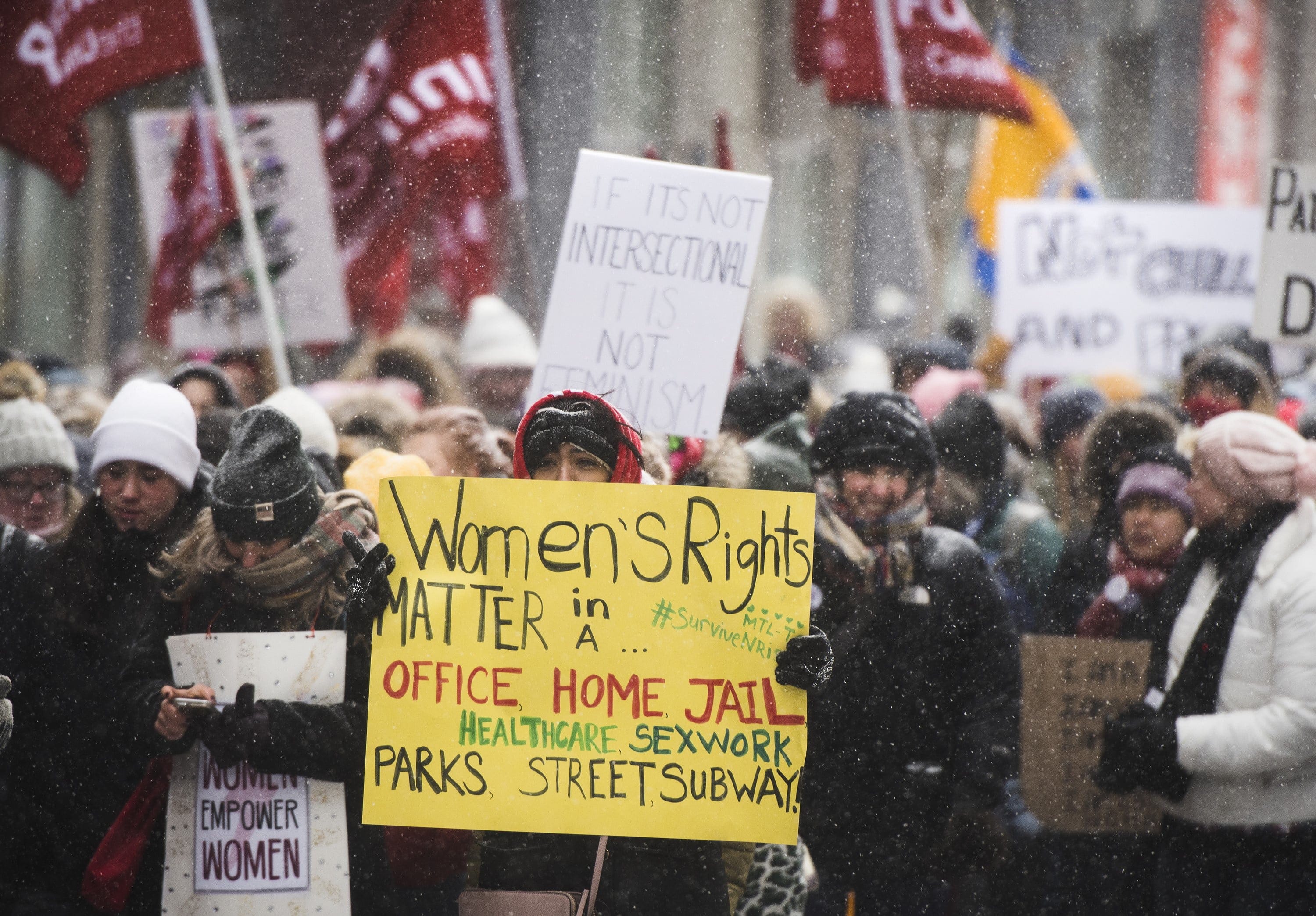 People brave the cold as they make their way towards Queen's Park during the Toronto Women's March on Saturday, January 19, 2019. THE CANADIAN PRESS/ Tijana Martin