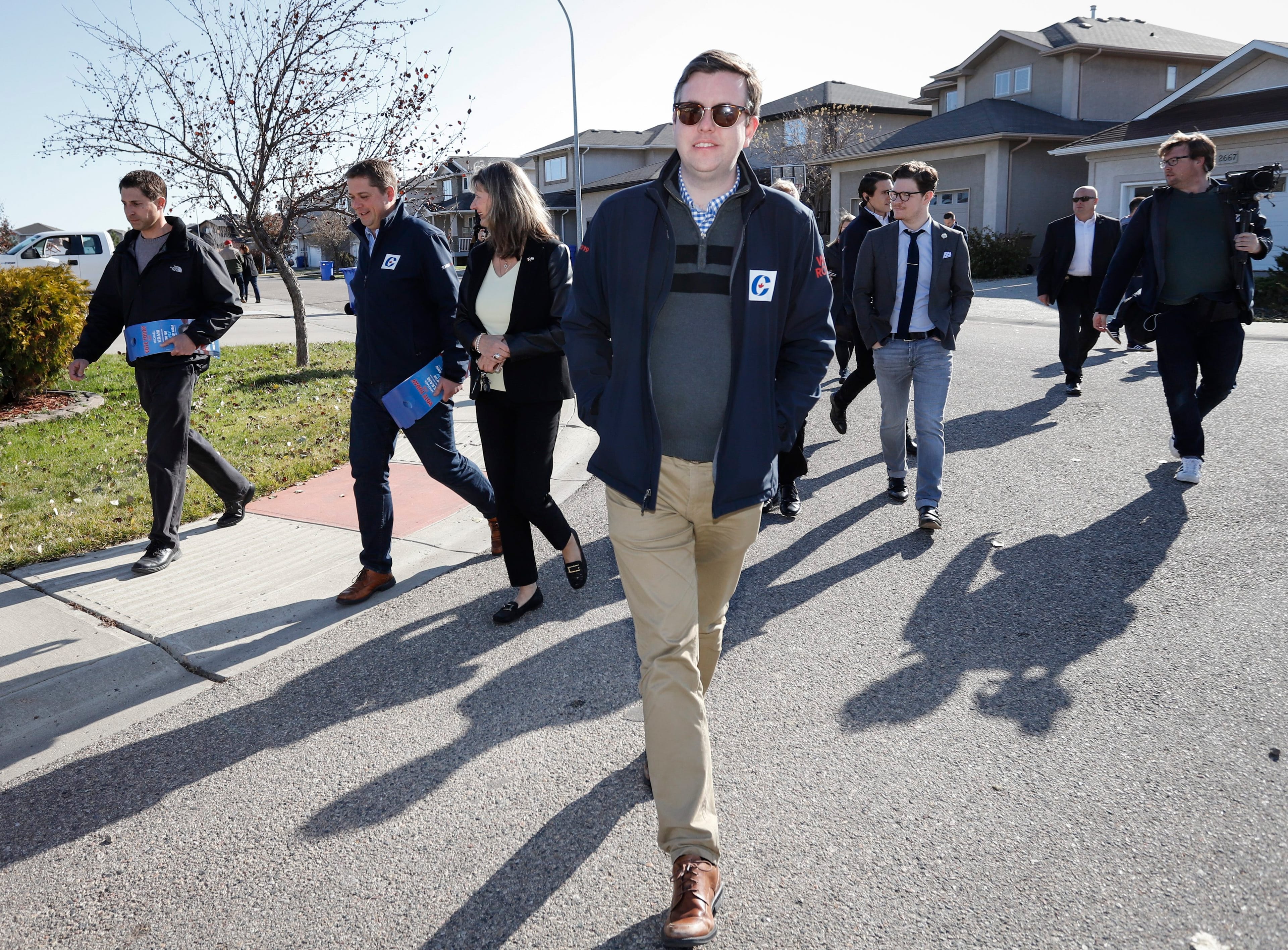 Marshall (centre) campaigns with Scheer (second from left) in Regina on Oct. 21, 2019 (THE CANADIAN PRESS/Jeff McIntosh)