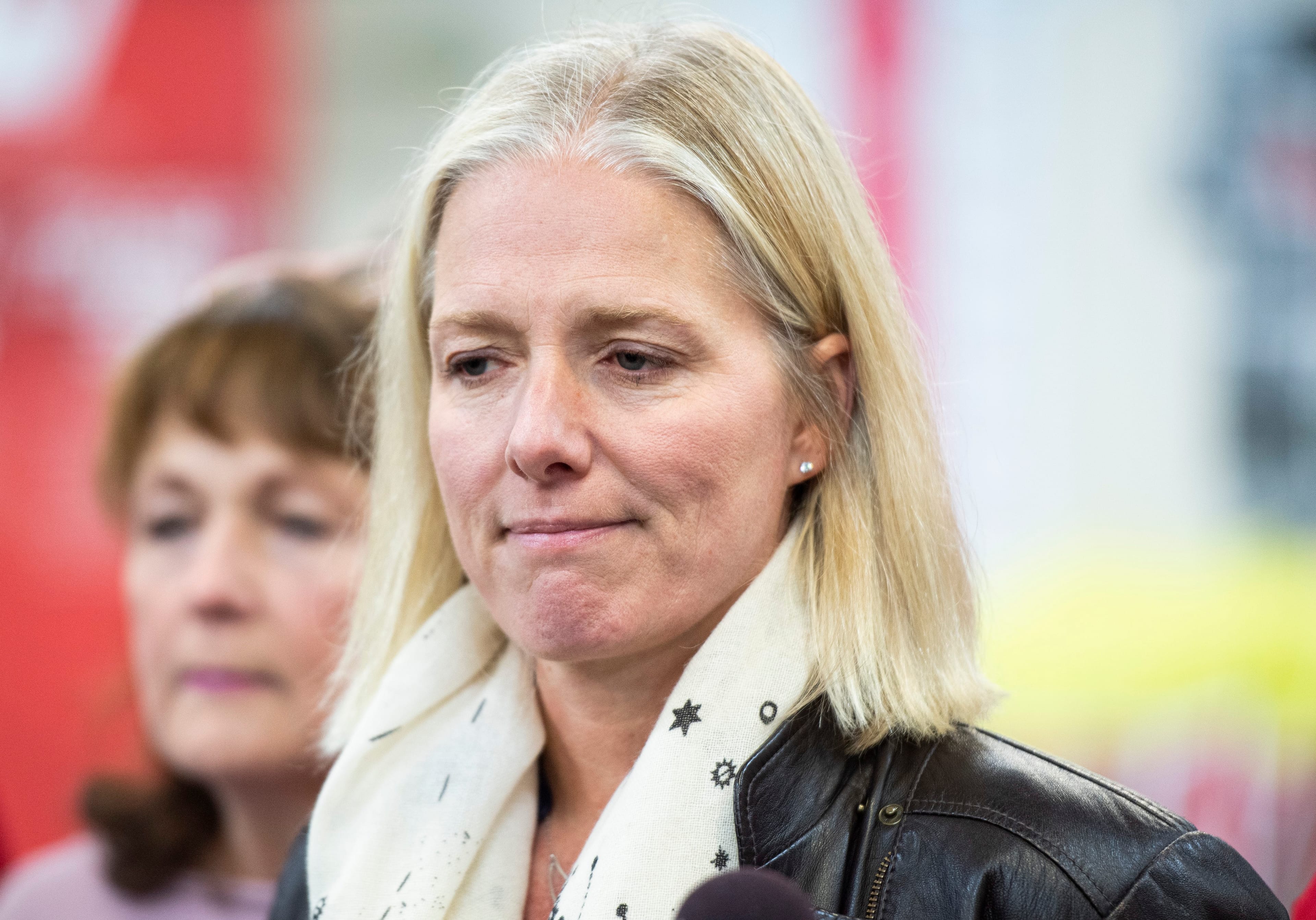 Re-elected Liberal MP Catherine McKenna speaks to reporters after her campaign office was defaced with a misogynistic slur, in Ottawa, on Thursday, Oct. 24, 2019. (CP/Justin Tang)
