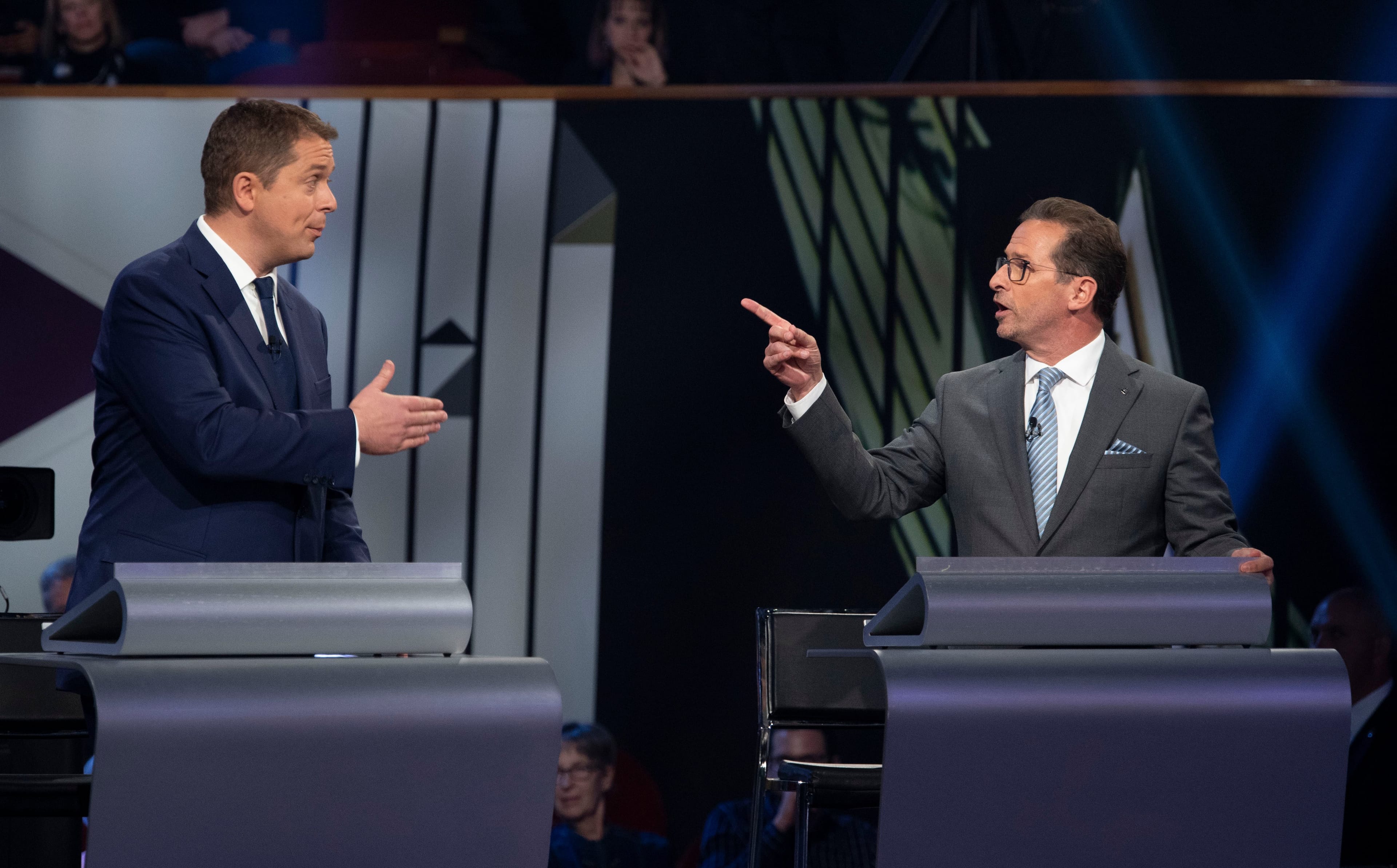 Bloc Quebecois leader Yves-Francois Blanchet and Conservative leader Andrew Scheer take part in the the Federal leaders French language debate in Gatineau, Que. on Thursday, October 10, 2019. (Adrian Wyld/CP)