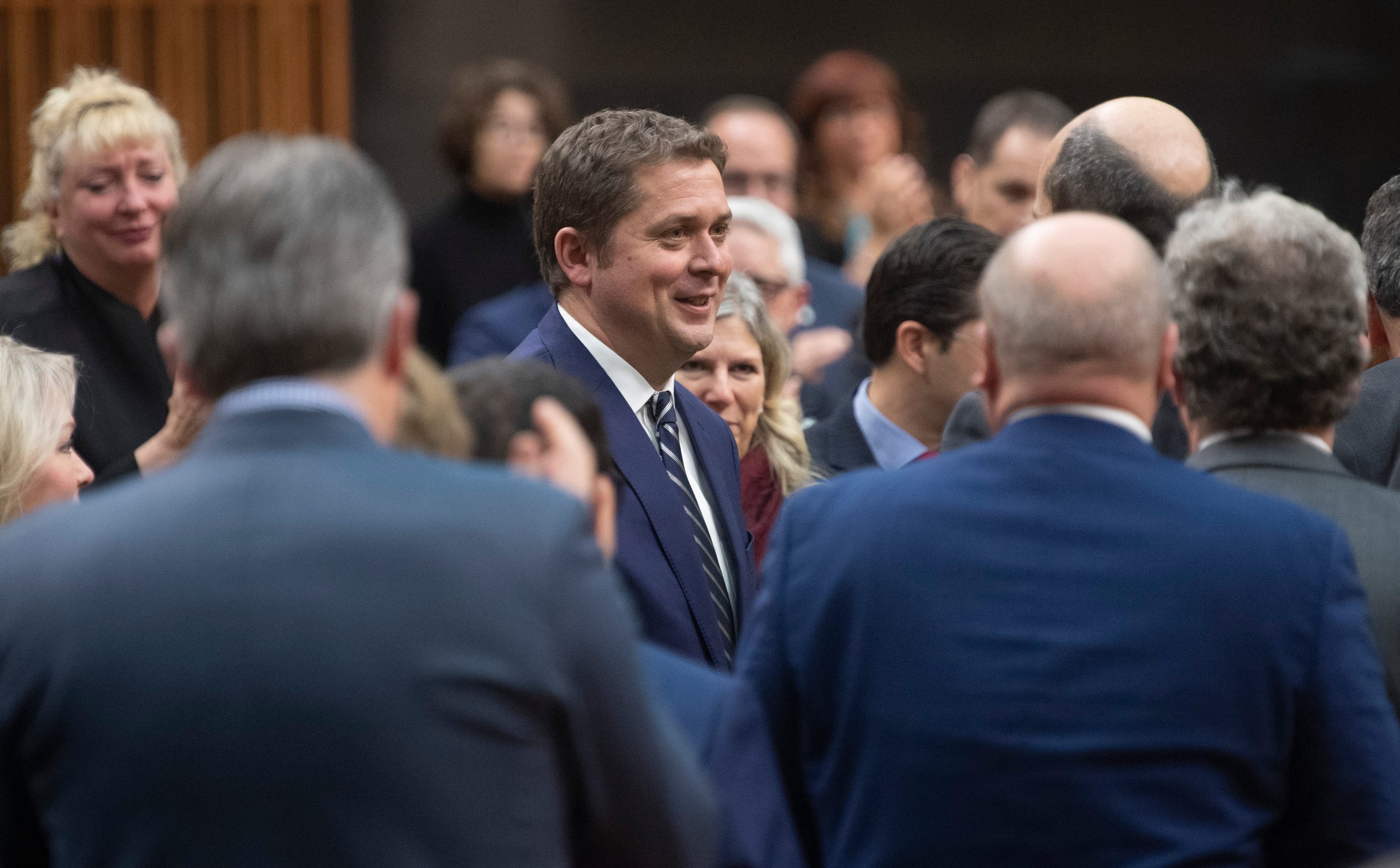 Conservative MP's pay their respects to Scheer following the announcement he will step down as leader of the party, on Dec. 12, 2019 (Adrian Wyld/CP)