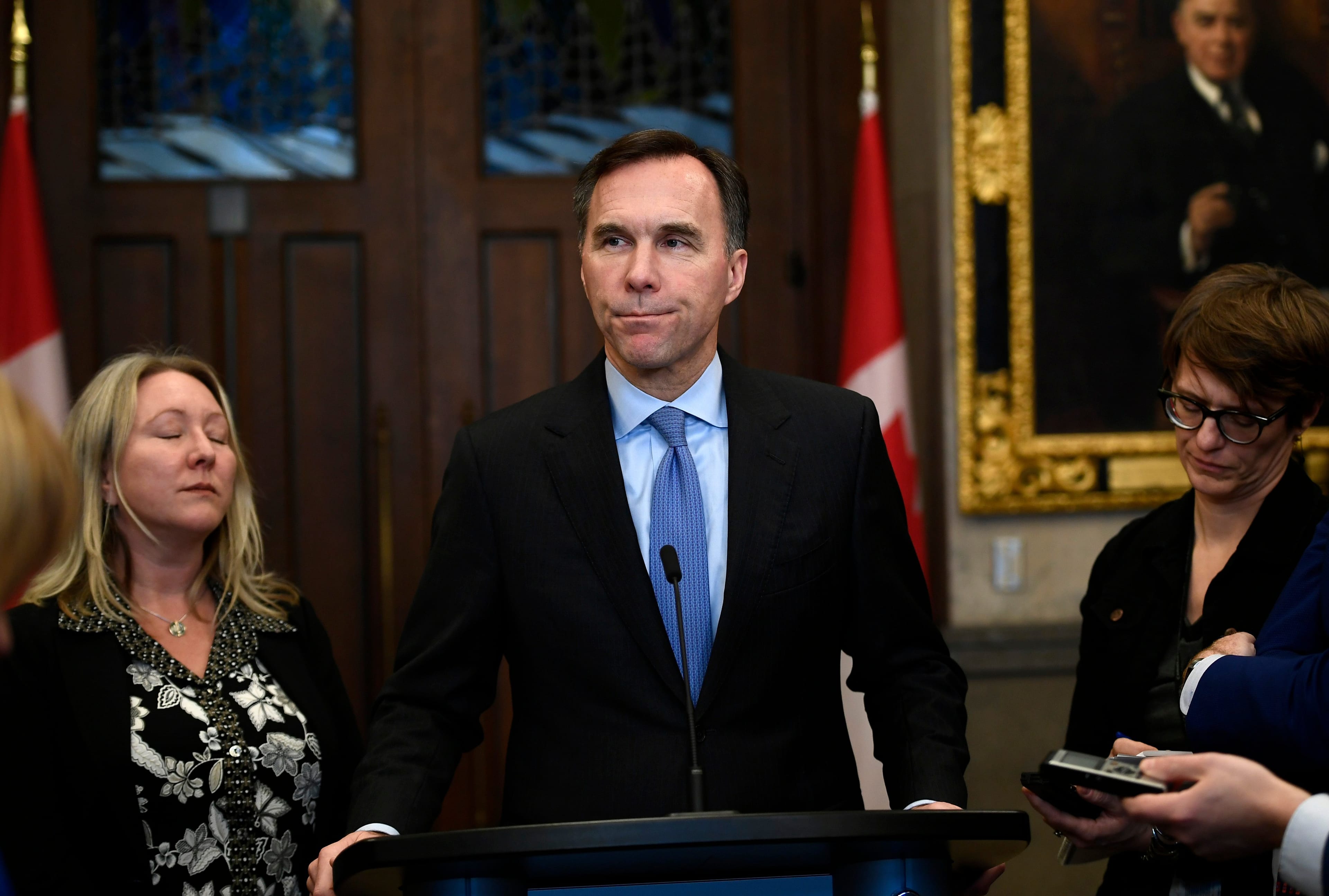 Minister of Finance Bill Morneau makes an announcement on lowering taxes for the middle class in the Foyer of the House of Commons on Parliament Hill in Ottawa, on Monday, Dec. 9, 2019. (Justin Tang/CP)