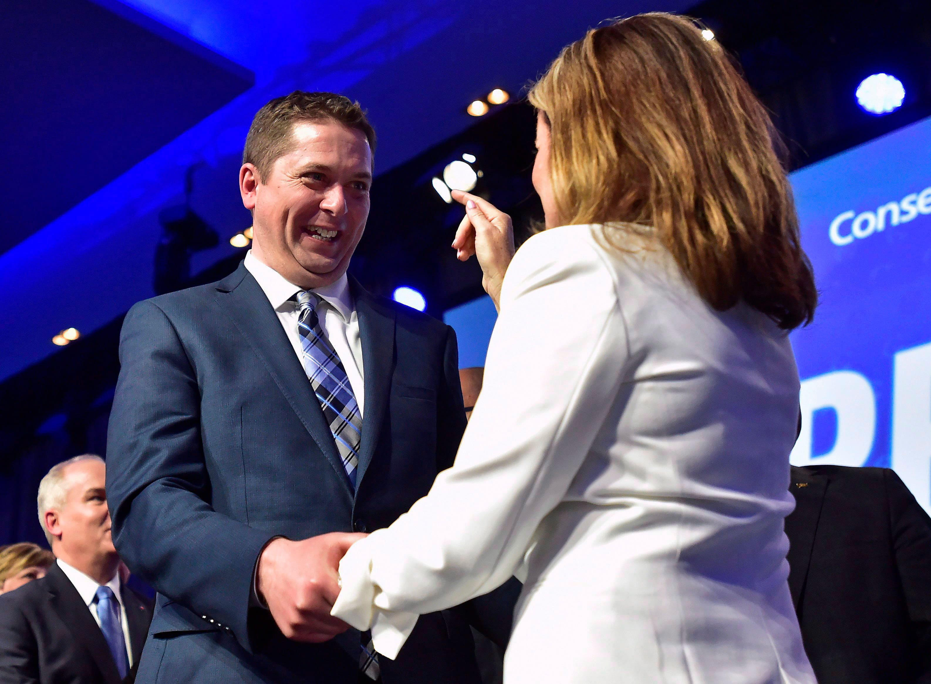 Scheer is congratulated by Rona Ambrose after being elected the new leader of the Conservative party on May 27, 2017 (Frank Gunn/CP)