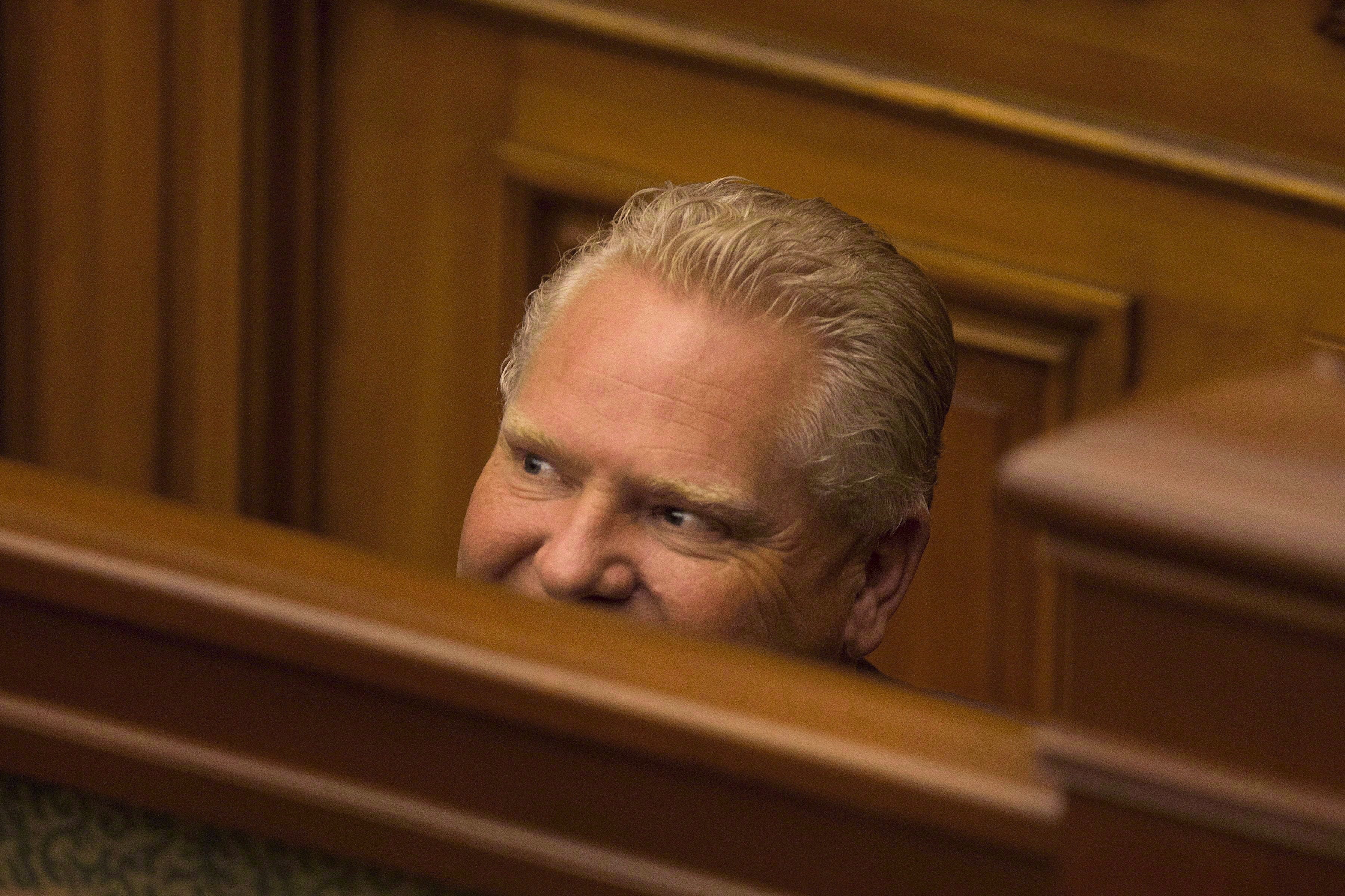 Ford attends a midnight session to debate a bill that would cut the size of Toronto city council, in Toronto on Sept. 17, 2018 (CP/Chris Young)