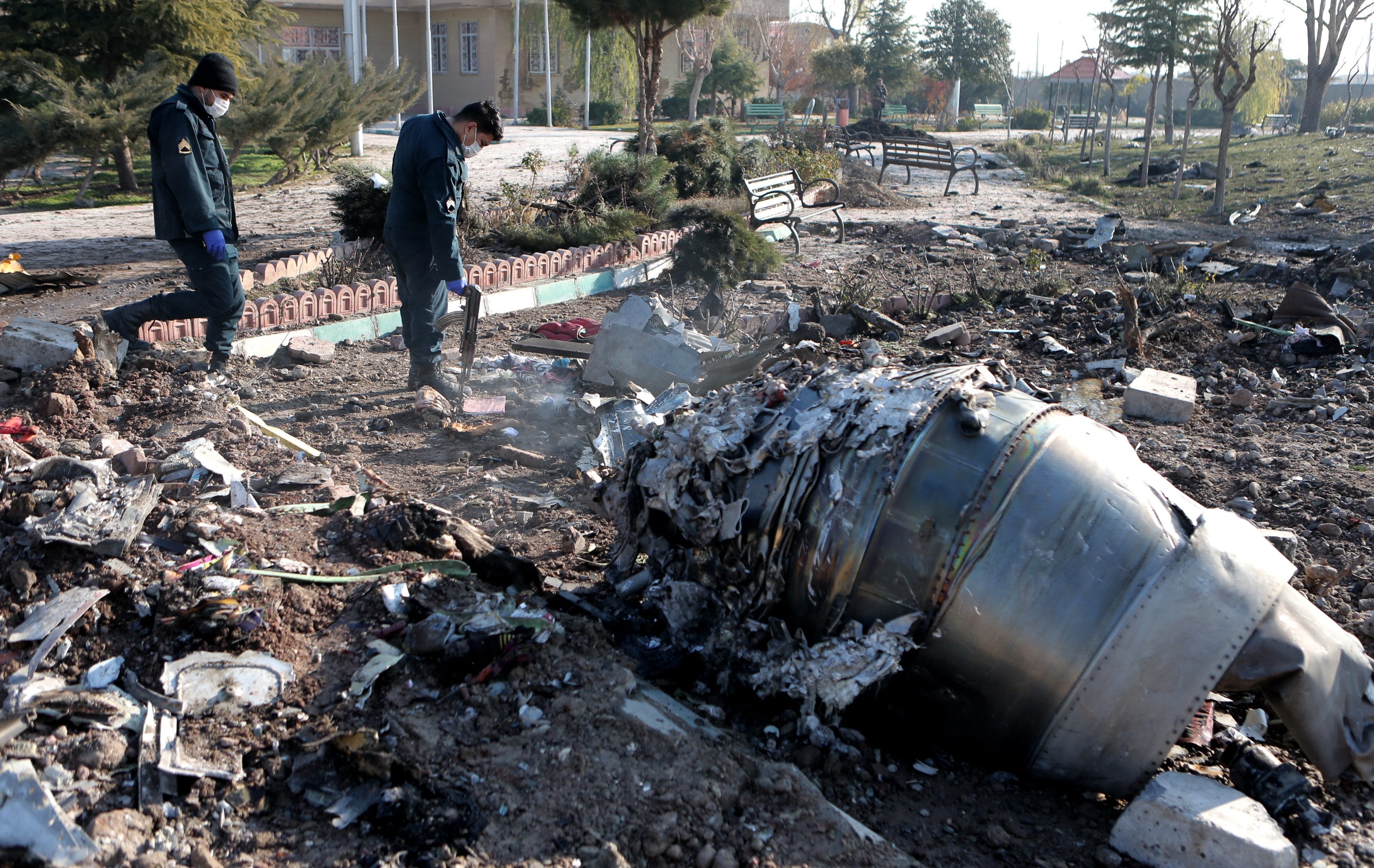 Rescuers work at the air crash site of a Boeing 737 Ukrainian passenger plane in Parand district, southern Tehran, Iran. (Ahmad Halabisaz/Xinhua/ZUMA)
