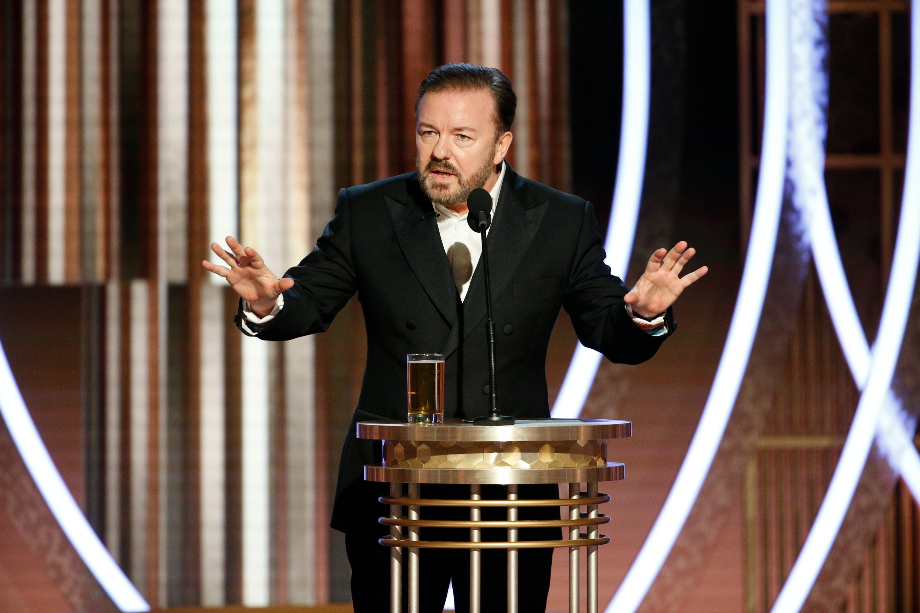 Ricky Gervais hosts the 77th Annual Golden Globe Awards on January 5, 2020 in Beverly Hills, California. (Paul Drinkwater/NBCUniversal Media/Getty Images)