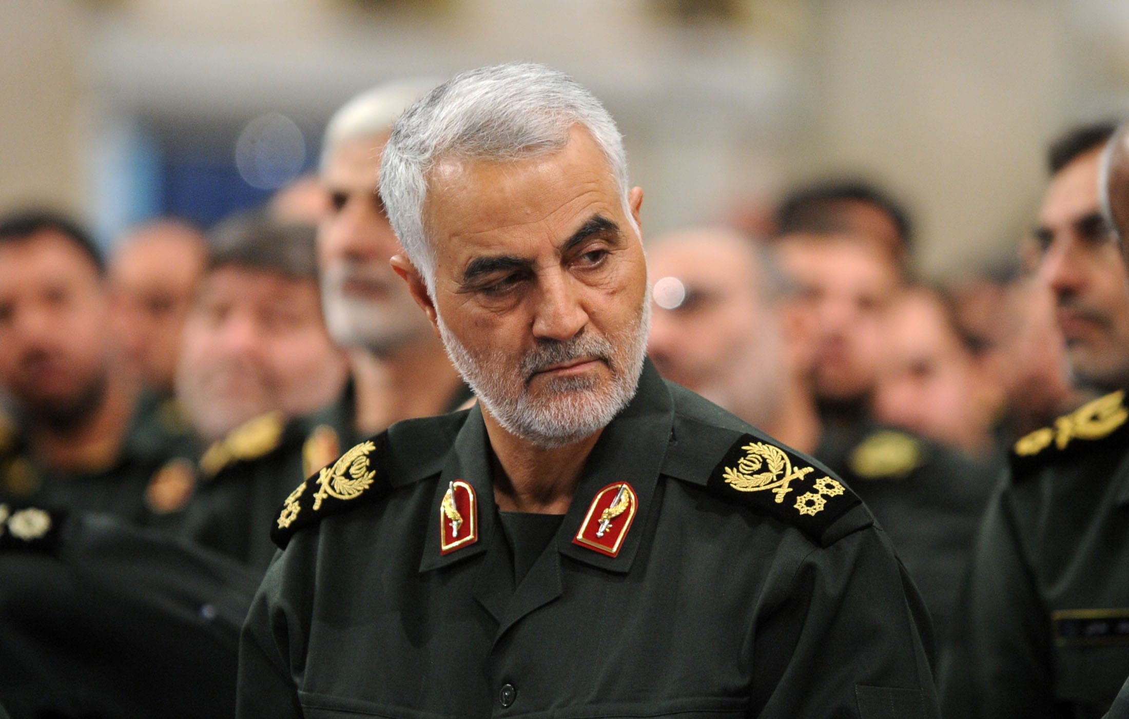Soleimani during Iranian Supreme Leader Ayatollah Ali Khamenei's meeting with Revolutionary Guards in 2016 (Pool/Iranian Supreme Leader Press Office/Anadolu Agency/Getty Images)