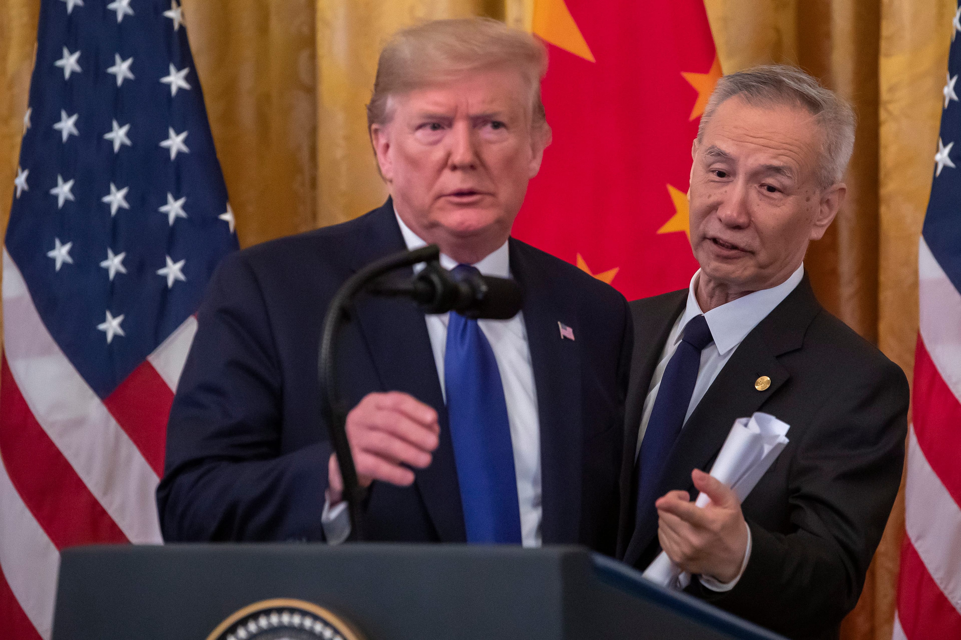 Trump at the signing ceremony with Chinese Vice Premier Liu He (Erik Lesser/EPA)