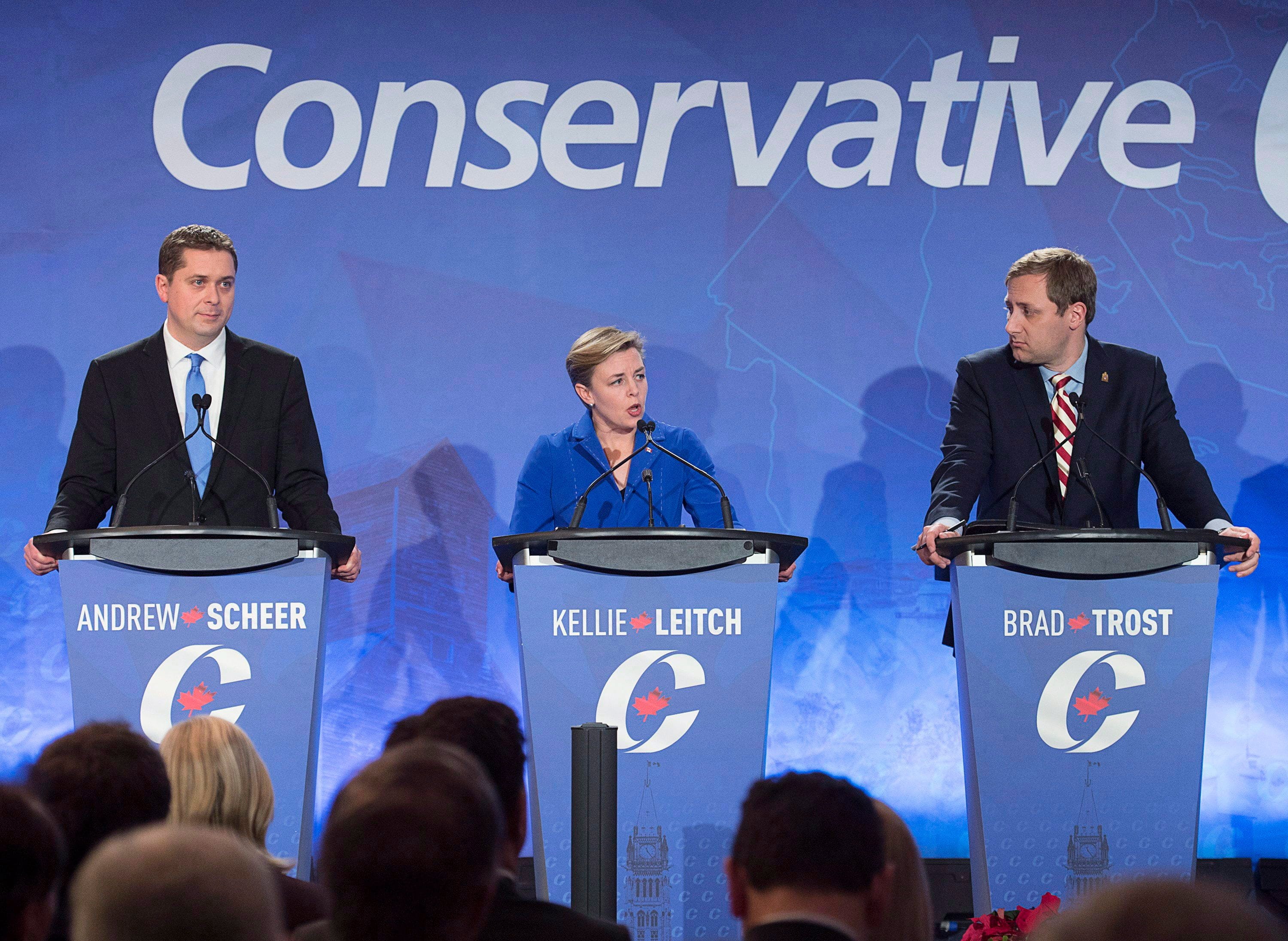 Andrew Scheer, Kellie Leitch and Brad Trost participate in the Conservative leadership candidates' debate in Moncton, N.B. on Dec. 6, 2016 (Andrew Vaughan/CP)