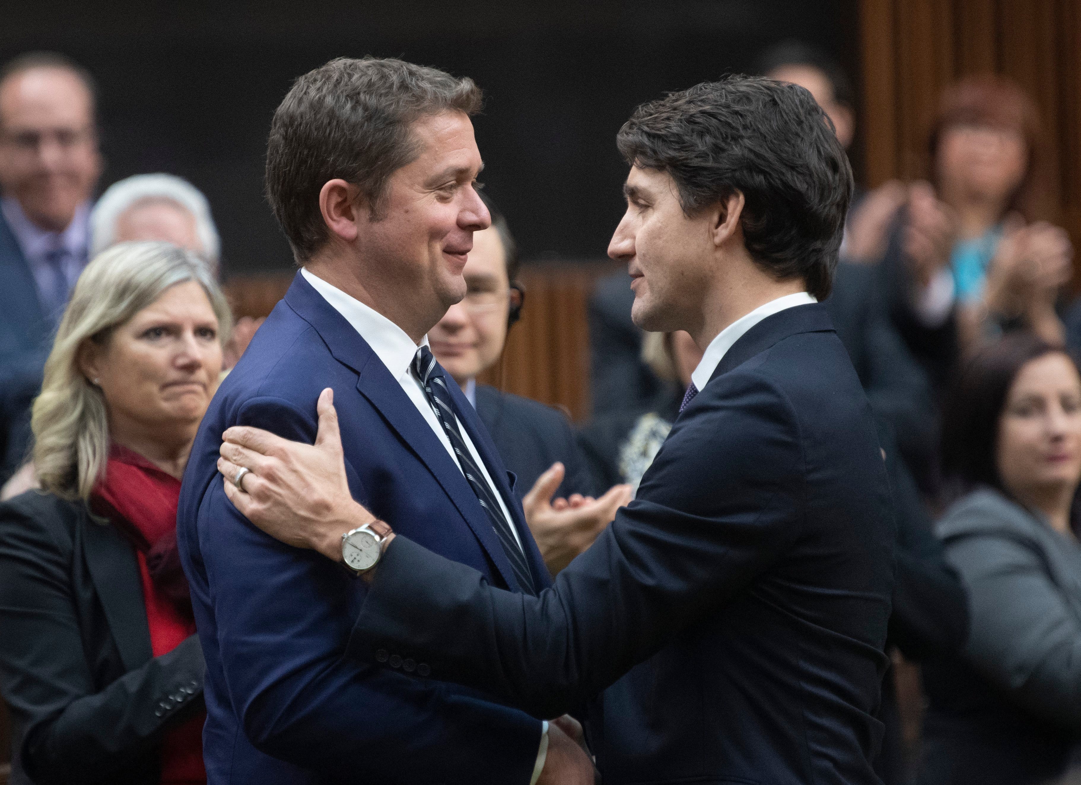 Trudeau shakes hands with Scheer after Scheer announced he will step down as leader of the Conservatives, Dec. 12, 2019 in the House of Commons in Ottawa (CP/Adrian Wyld)