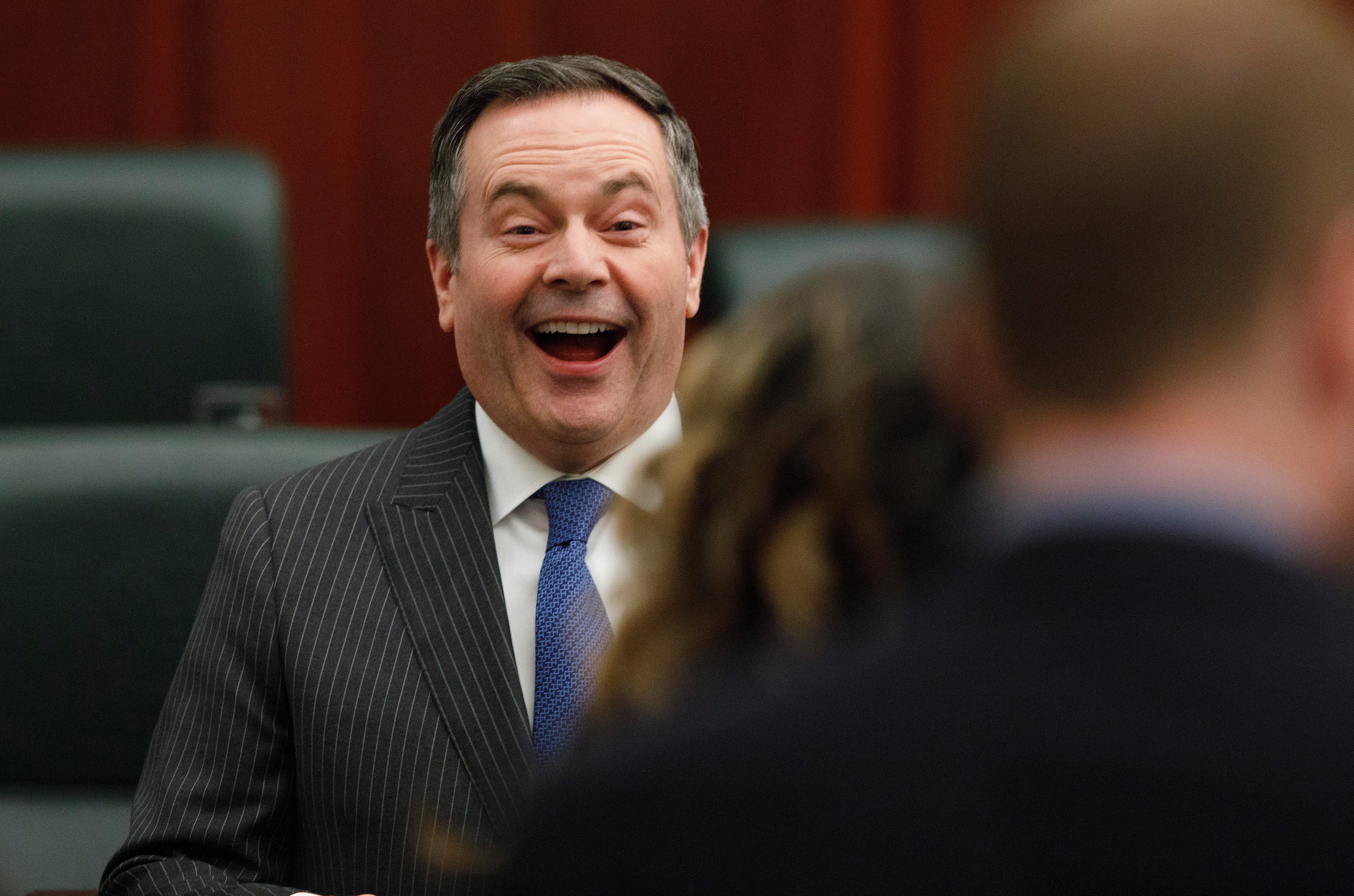 Kenney has a laugh after the Speech from the Throne in Edmonton on Feb. 25, 2020 (CP/Jason Franson)