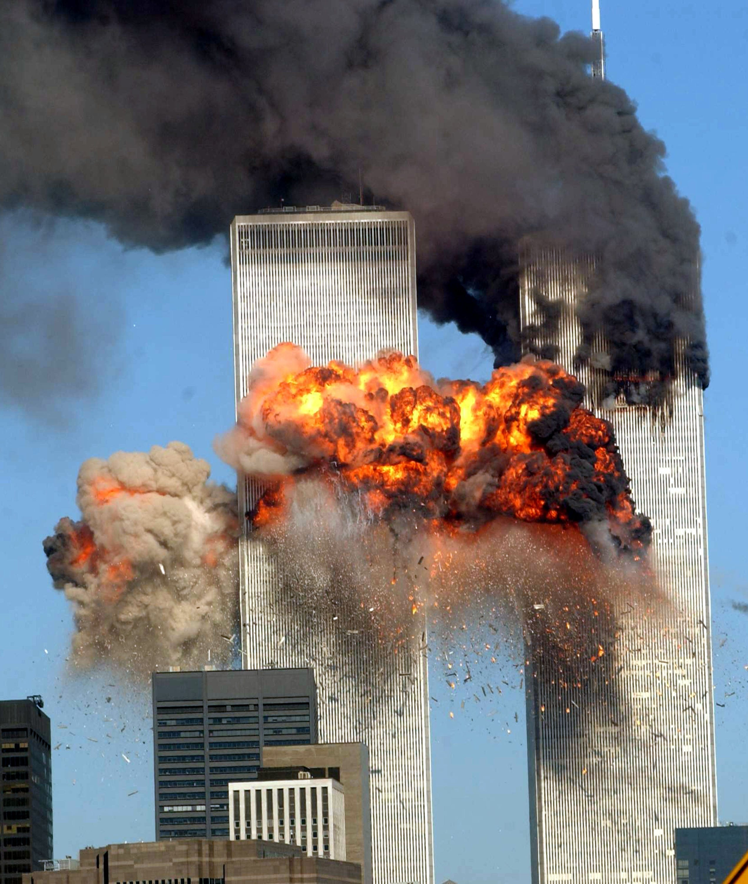 A fiery blasts rocks the south tower of the World Trade Center as the hijacked United Airlines Flight 175 from Boston crashes into the building on Sept. 11, 2001 in New York City. (Spencer Platt/Getty Images)