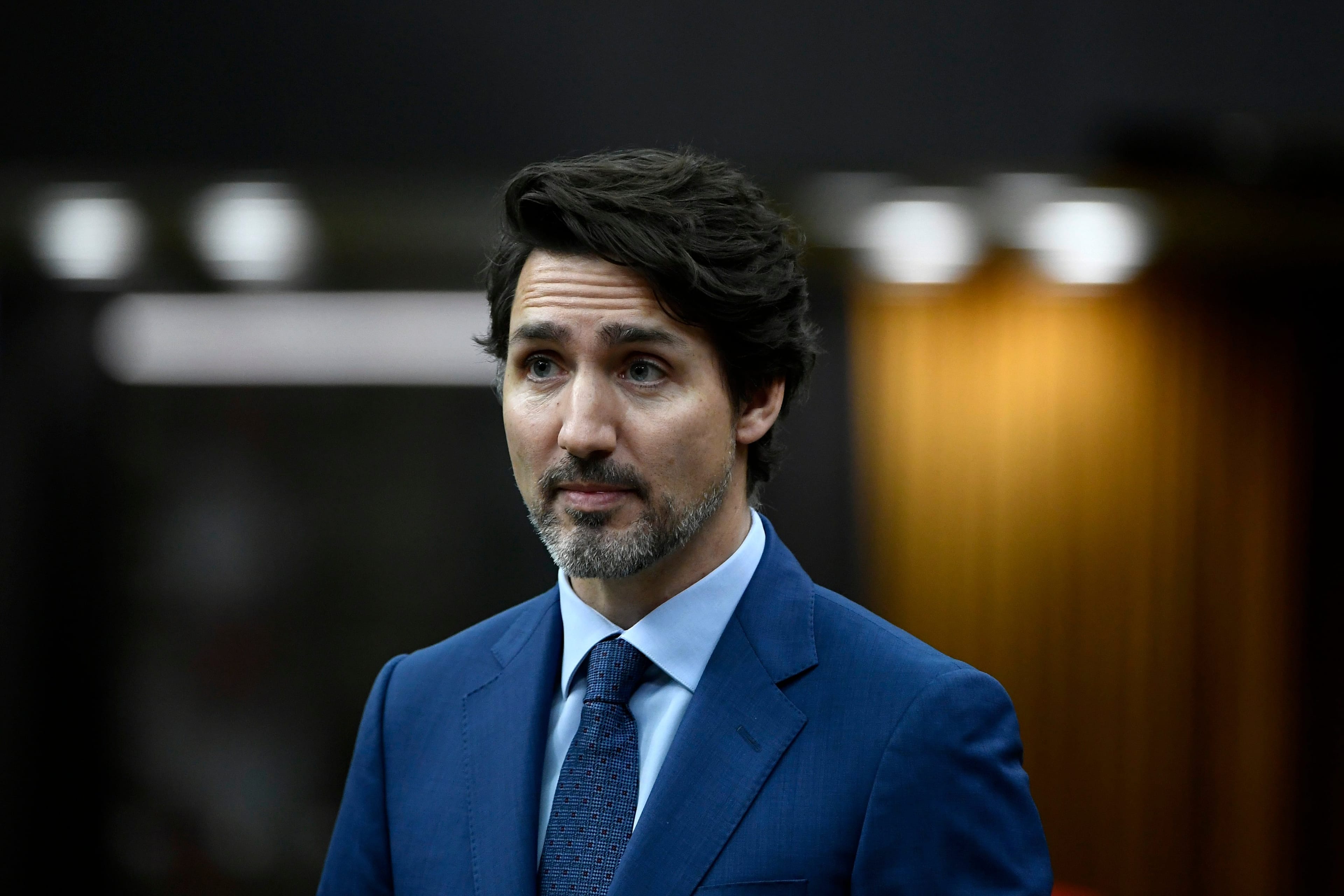 Trudeau rises in the House of Commons as Parliament considers measures related to the COVID-19 pandemic, on April 11, 2020 (CP/Justin Tang)